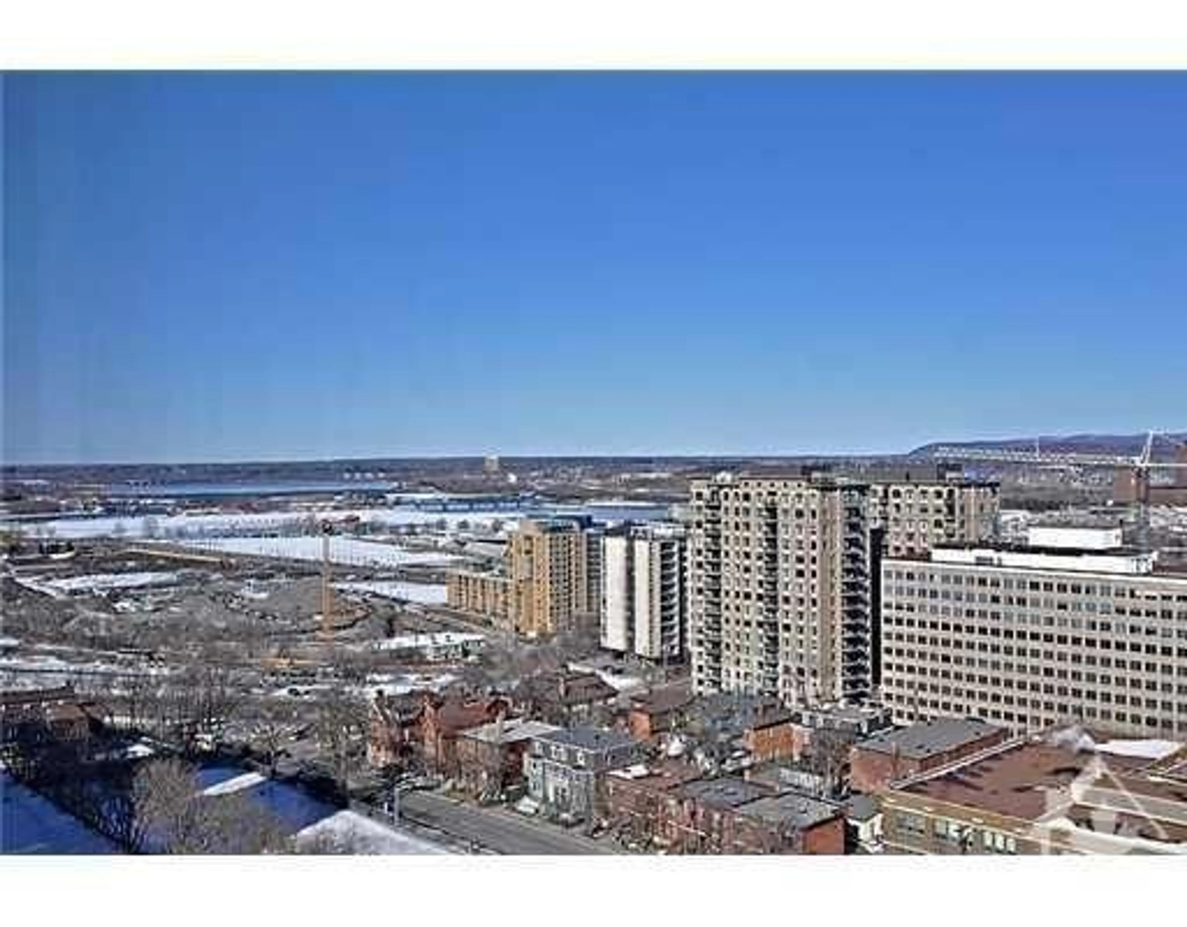 A pic from exterior of the house or condo, the view of city buildings for 500 LAURIER Ave #2205, Ottawa Ontario K1R 5E1