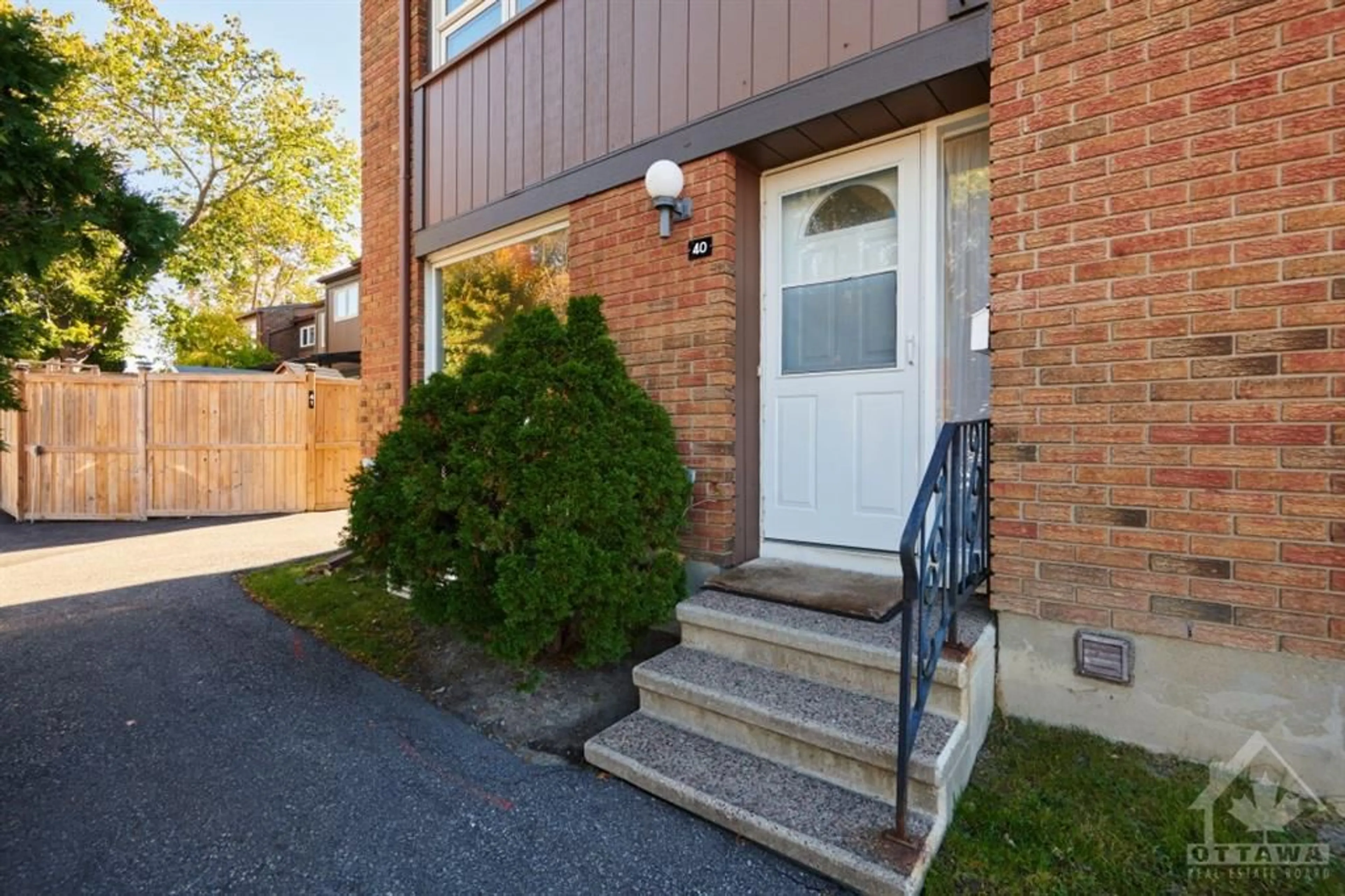 A pic from exterior of the house or condo, the street view for 2111 MONTREAL Rd #40, Ottawa Ontario K1J 8M8