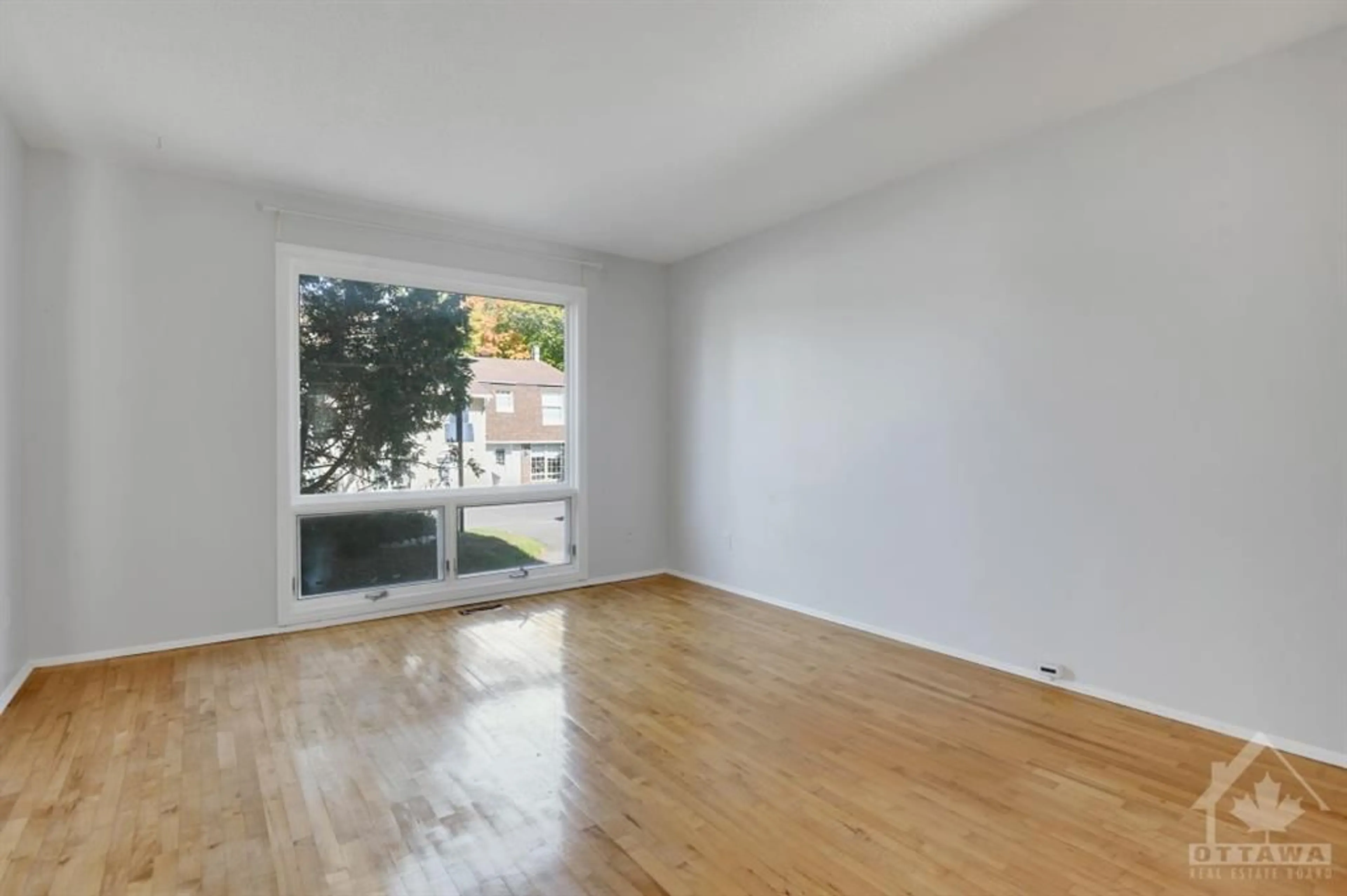 A pic of a room, wood floors for 2111 MONTREAL Rd #40, Ottawa Ontario K1J 8M8