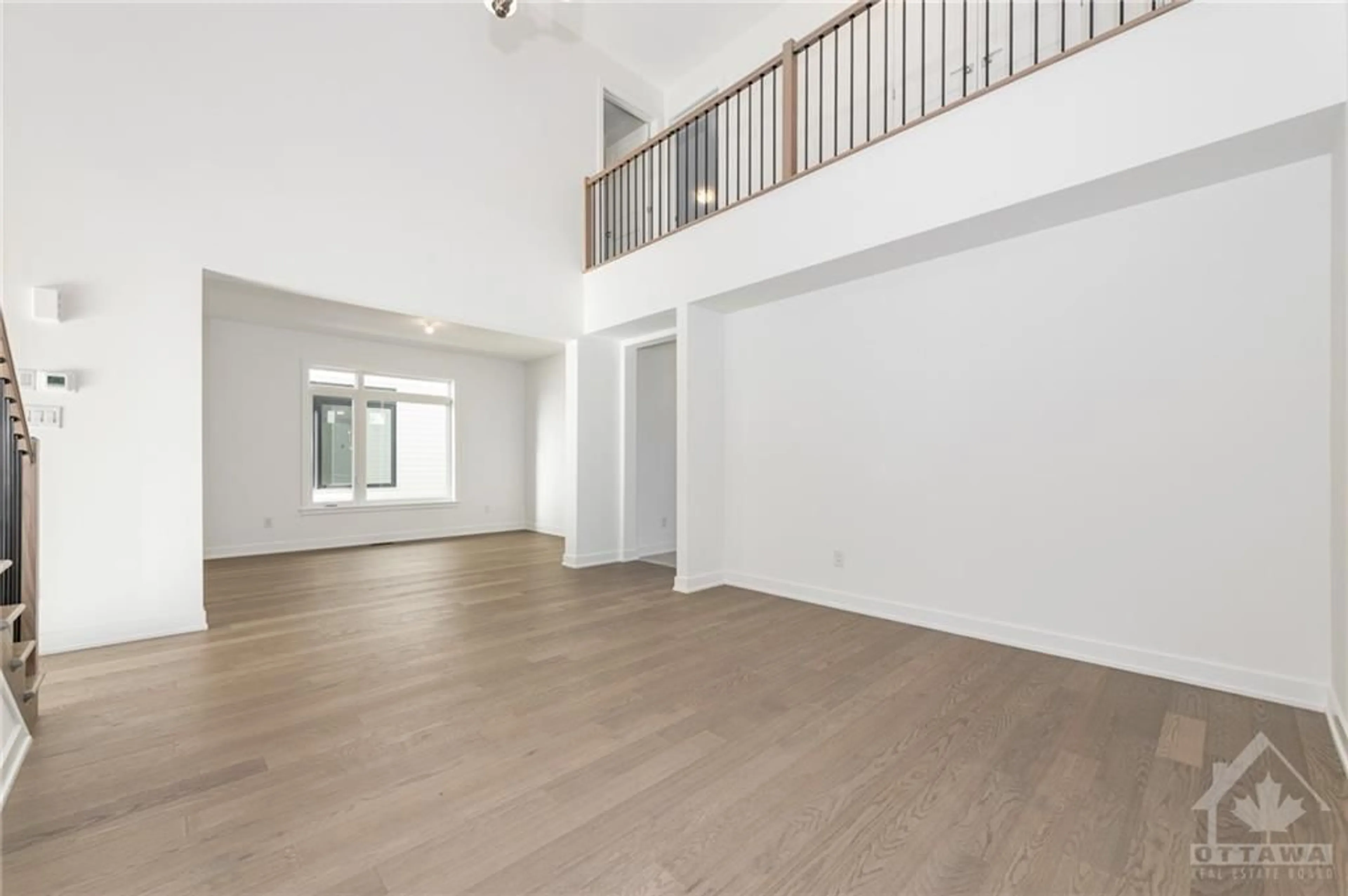 A pic of a room, wood floors for 423 SHUTTLEWORTH Dr, Ottawa Ontario K1T 3W7