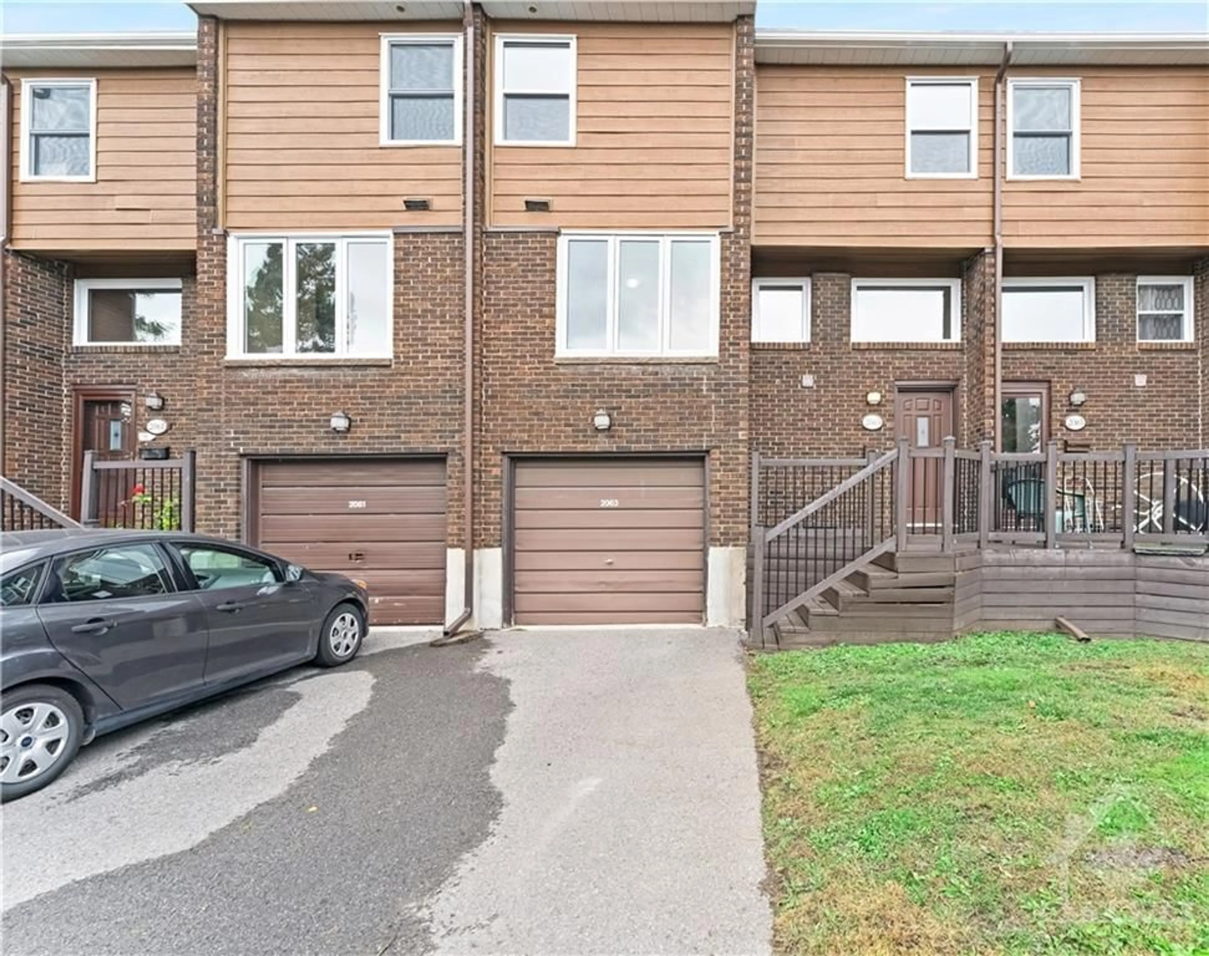 A pic from exterior of the house or condo, the street view for 2063 ENA Lane, Ottawa Ontario K1B 4P3