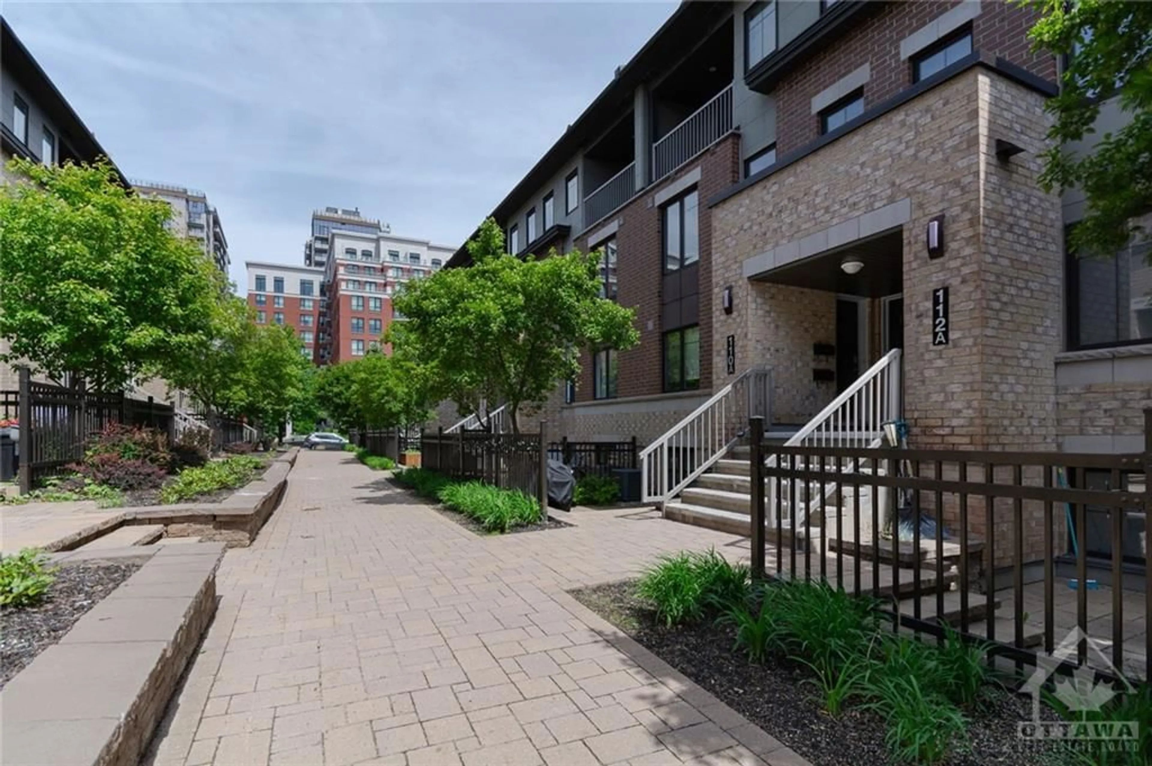 A pic from exterior of the house or condo, the street view for 110 LINDENSHADE Dr #B, Ottawa Ontario K2J 5R5