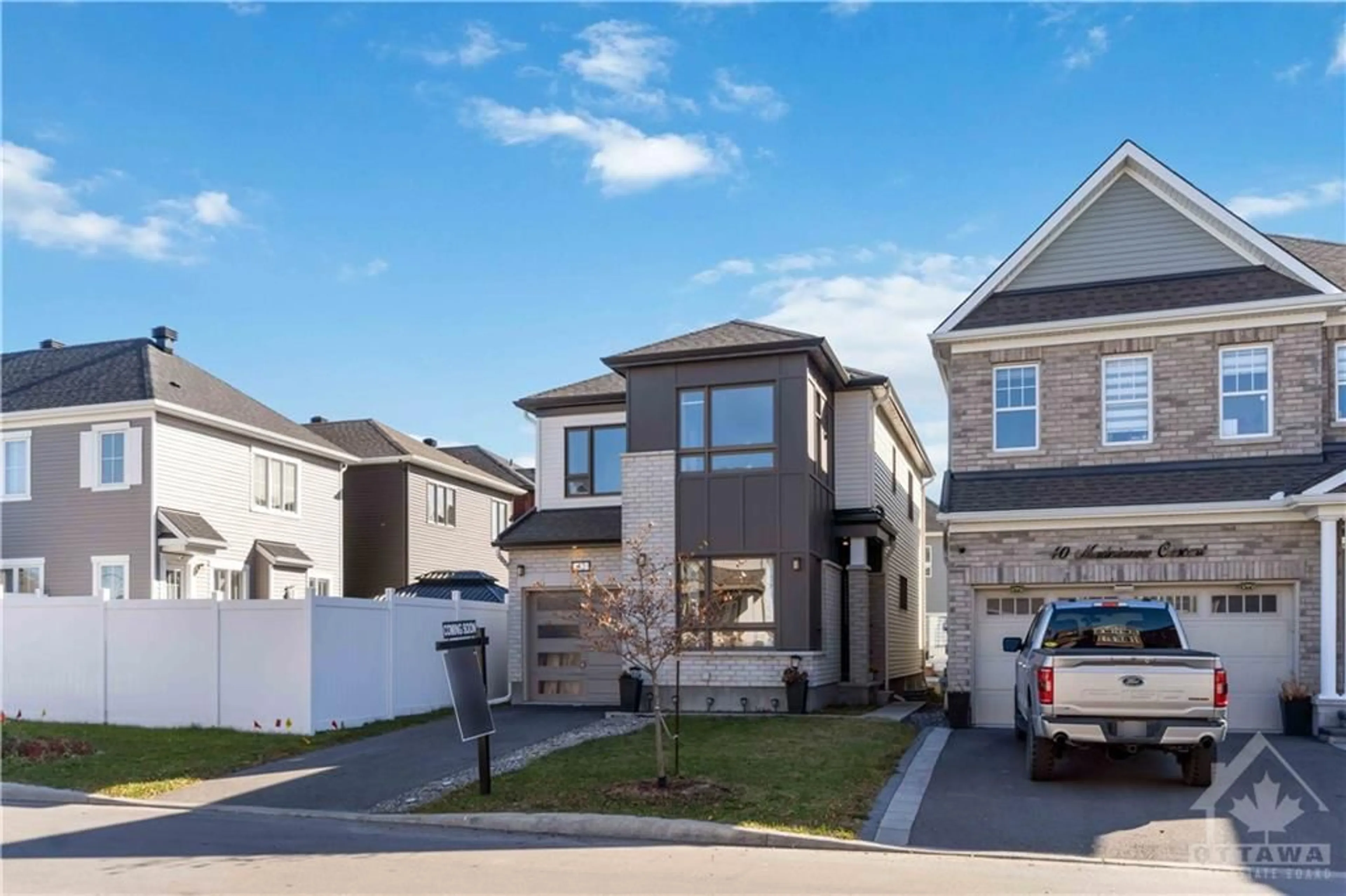 Frontside or backside of a home, the fenced backyard for 42 MUDMINNOW Cres, Ottawa Ontario K4A 5H8