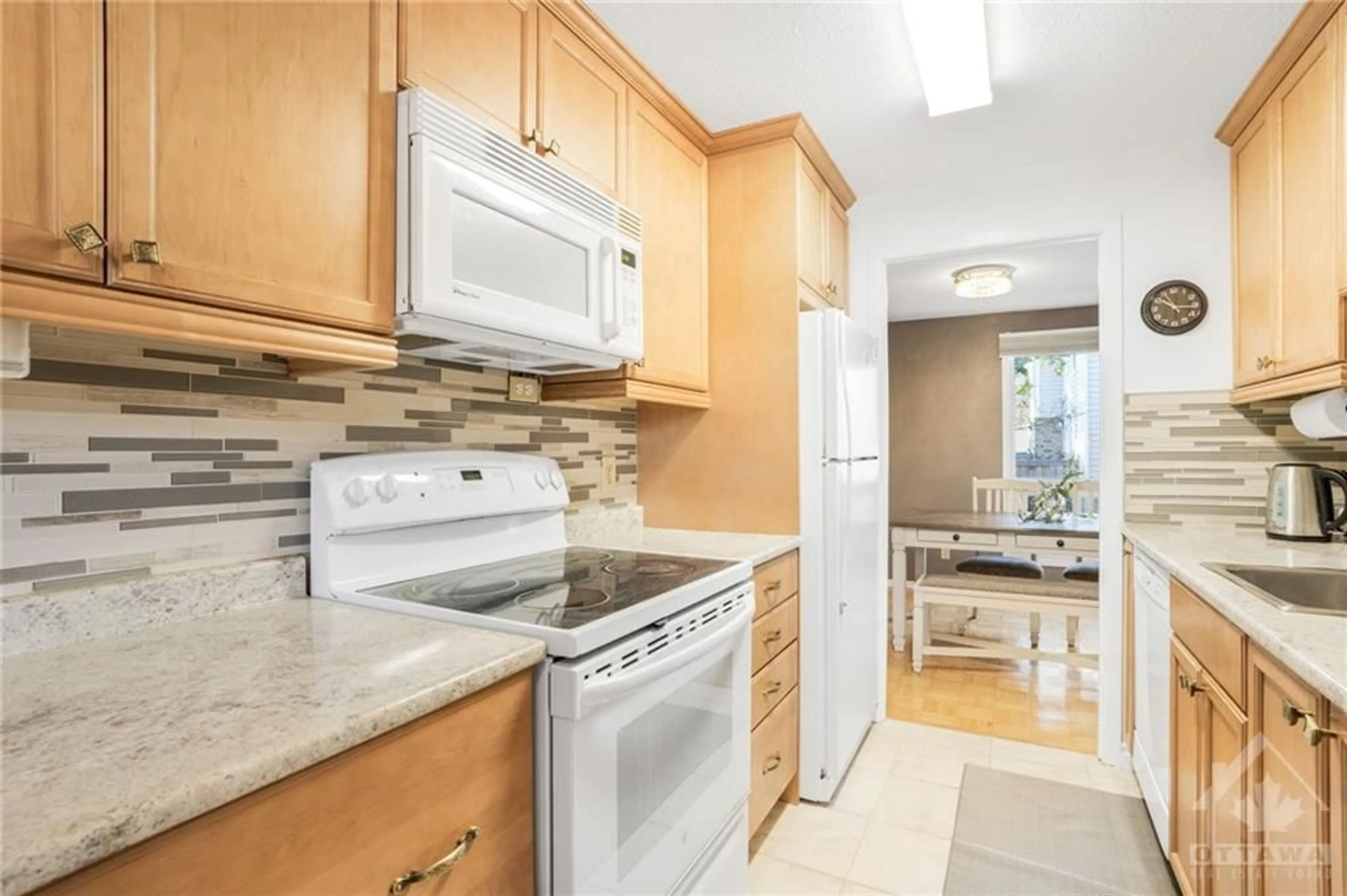 Standard kitchen, wood floors, cottage for 55 MALVERN Dr, Ottawa Ontario K2J 1M8