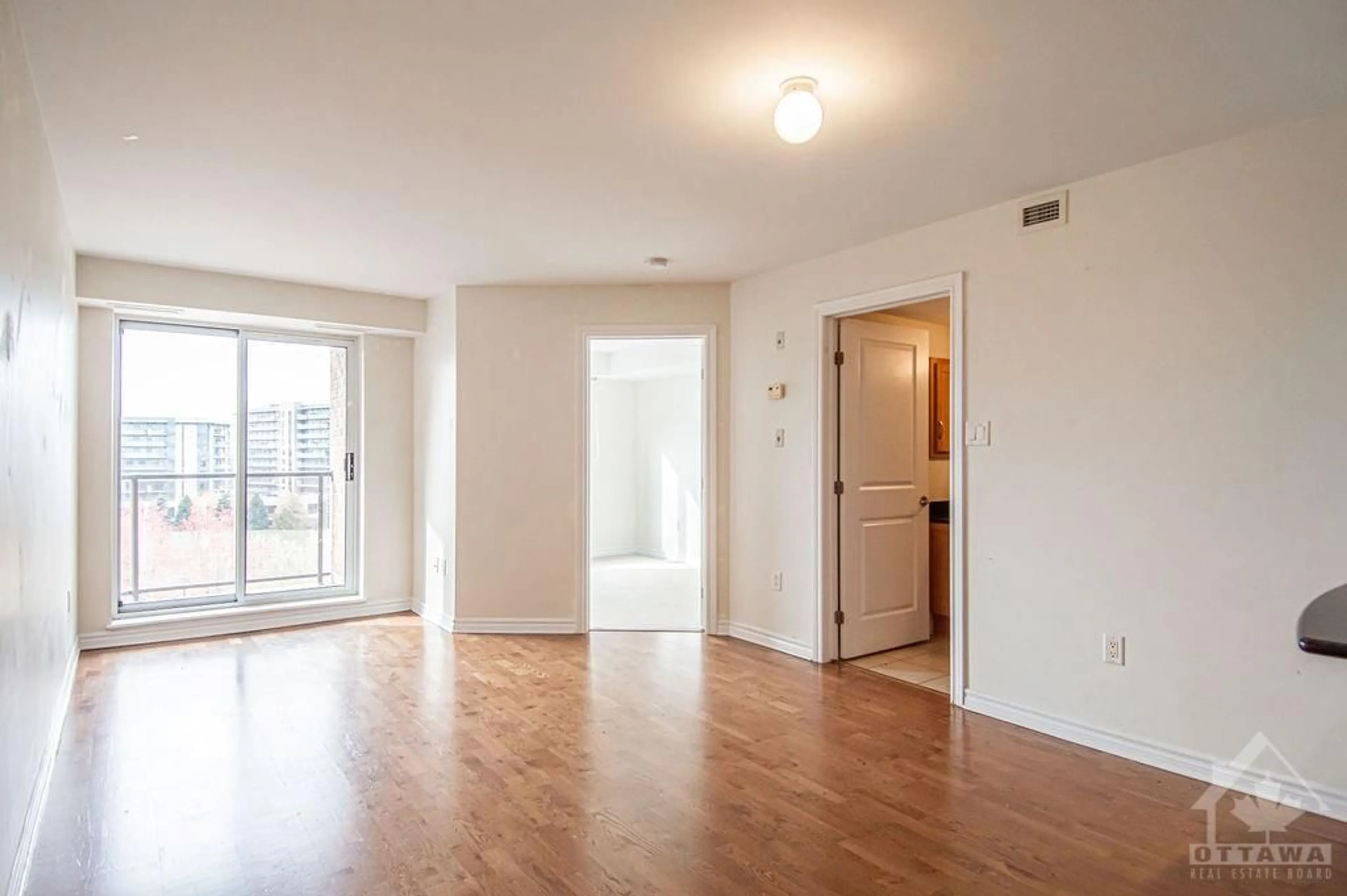 A pic of a room, wood floors for 314 CENTRAL PARK Dr #702, Ottawa Ontario K2C 4G4