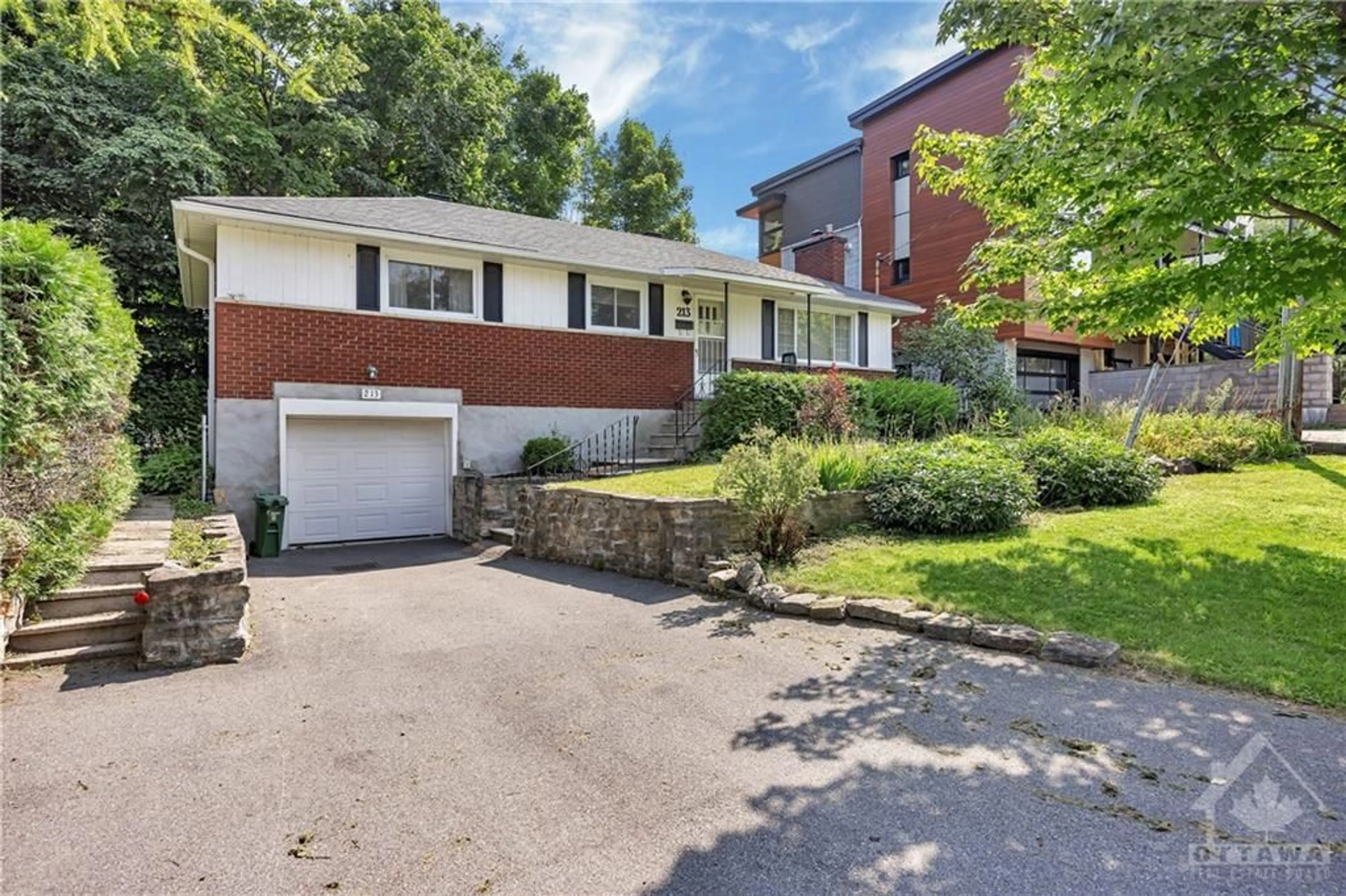 Frontside or backside of a home, the street view for 213 ANCASTER Ave, Ottawa Ontario K2B 5B2