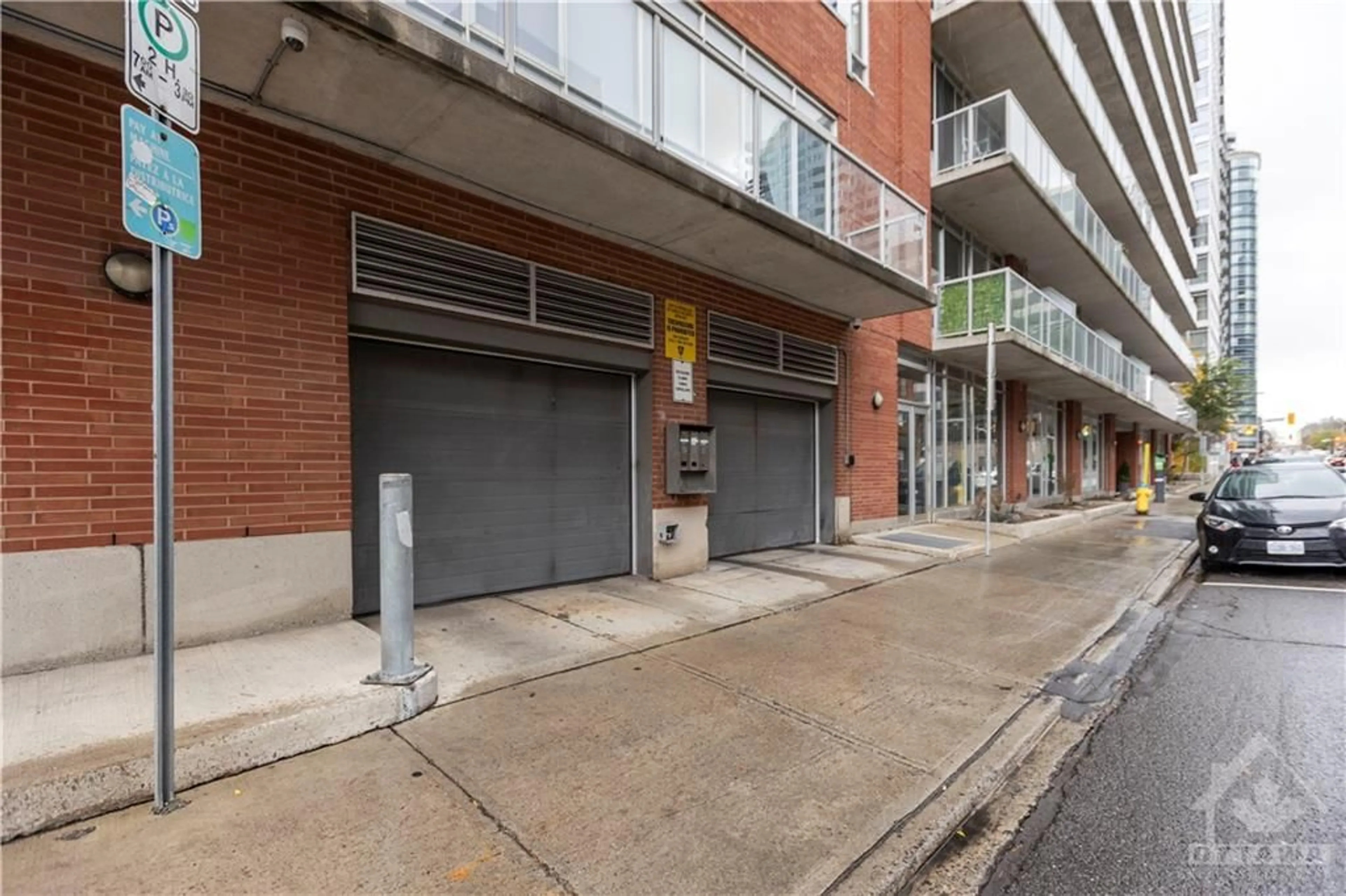 A pic from exterior of the house or condo, the street view for 383 CUMBERLAND St #710, Ottawa Ontario K1N 1J7