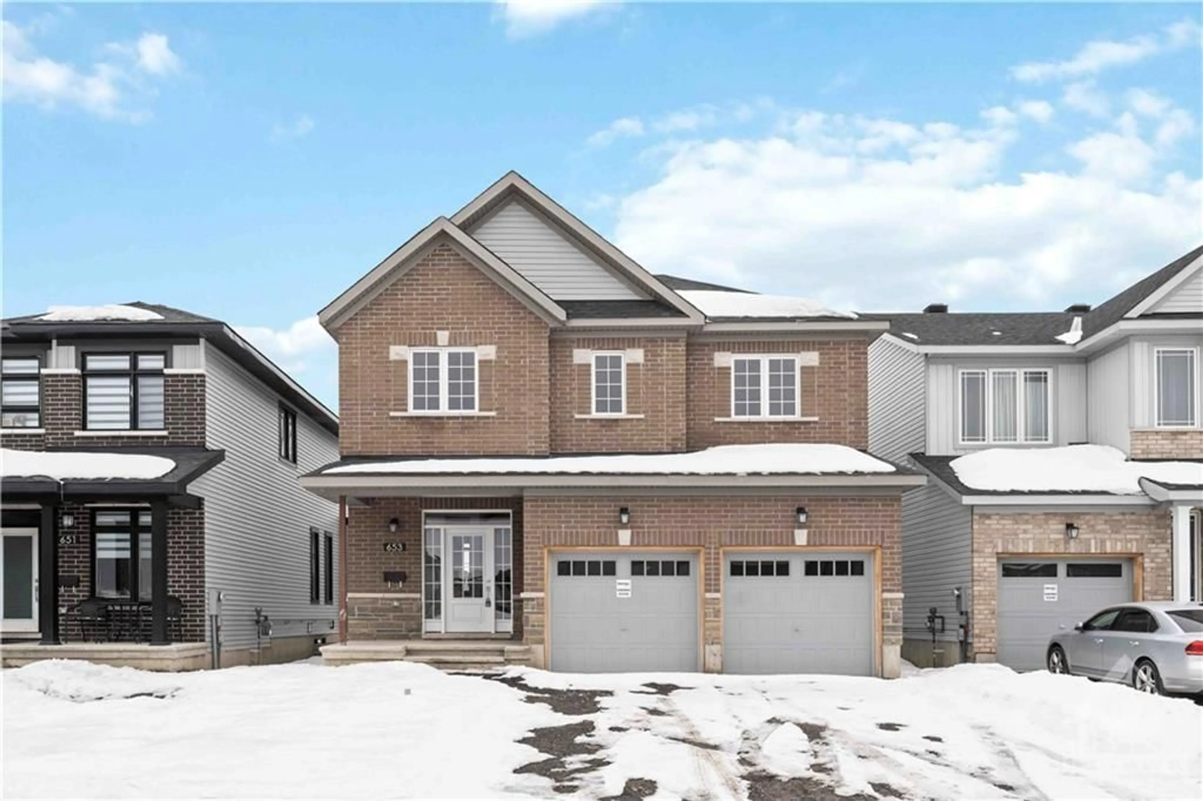 Frontside or backside of a home, the street view for 653 PERSIMMON Way, Ottawa Ontario K1W 0T3