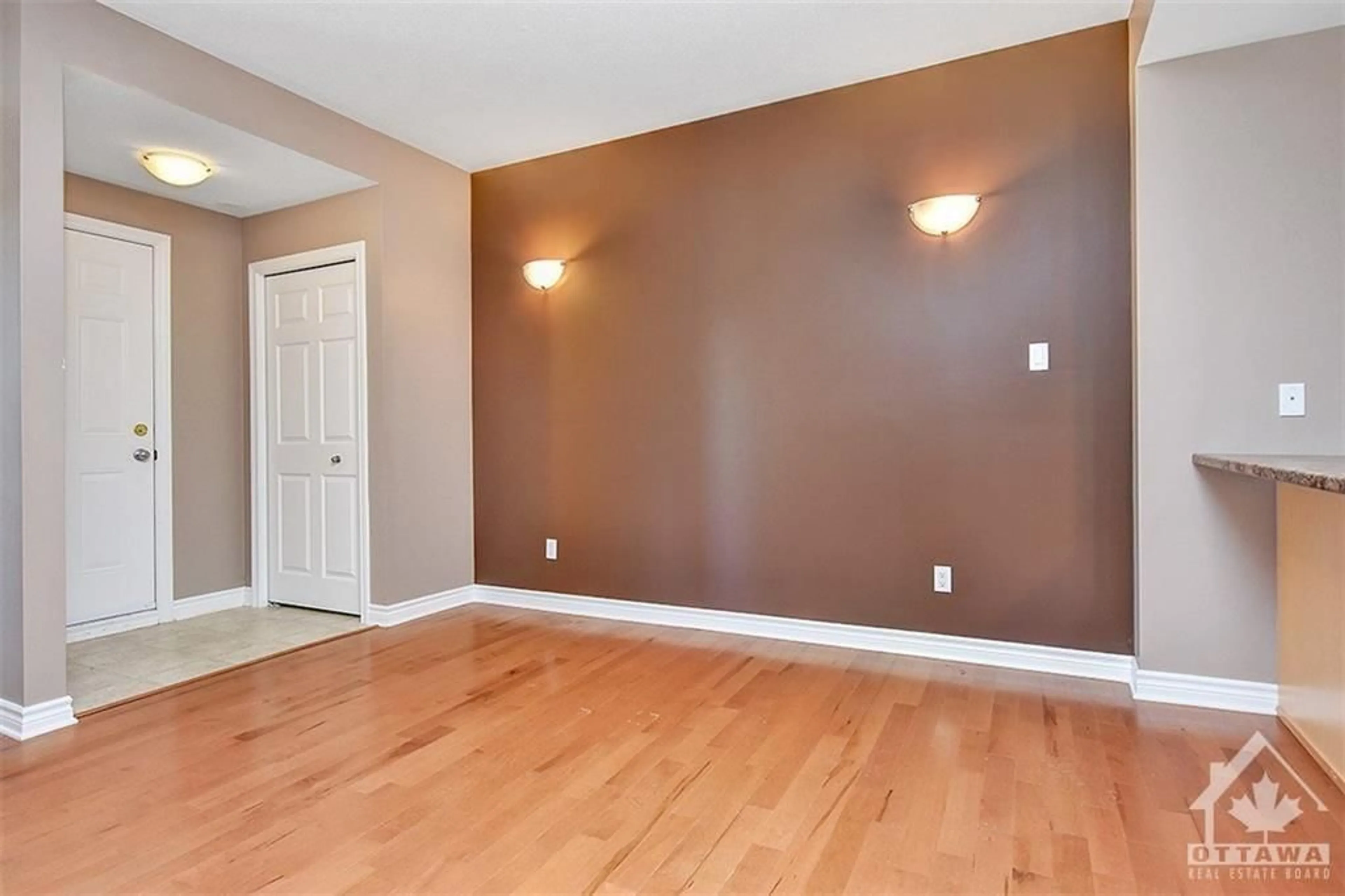 A pic of a room, wood floors for 139 HARTHILL Way #B, Ottawa Ontario K2J 4B1