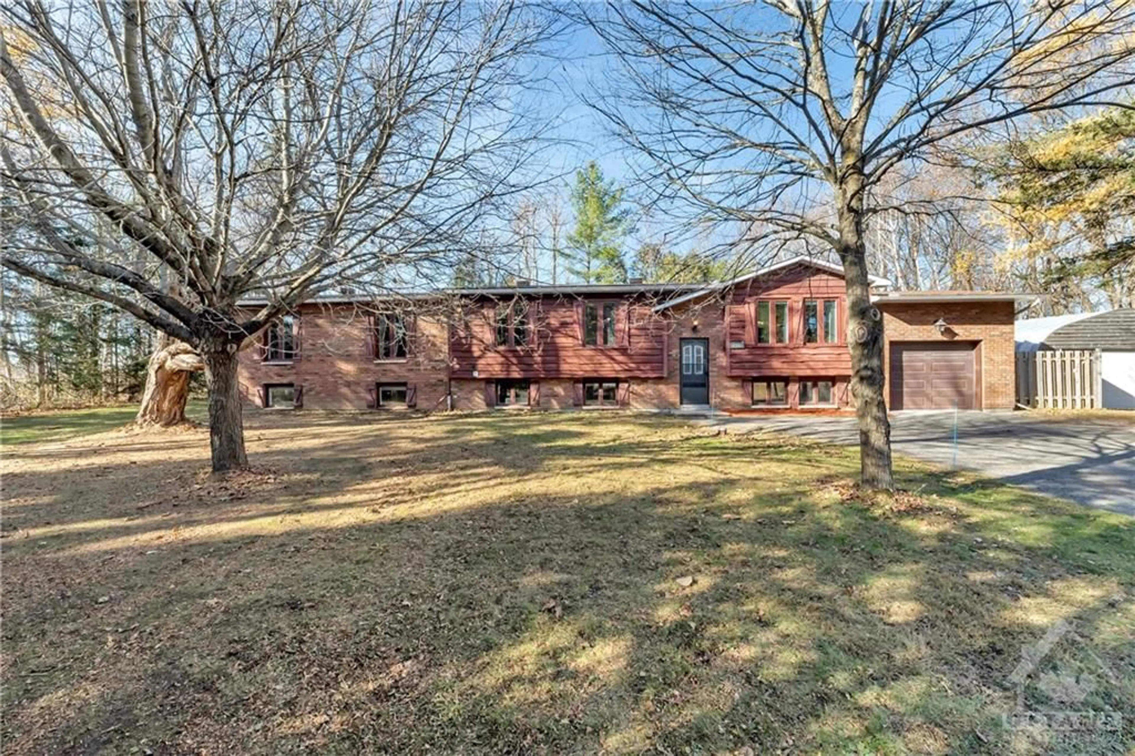 A pic from exterior of the house or condo, the fenced backyard for 6366 ROTHBOURNE Rd, Stittsville Ontario K0A 1L0