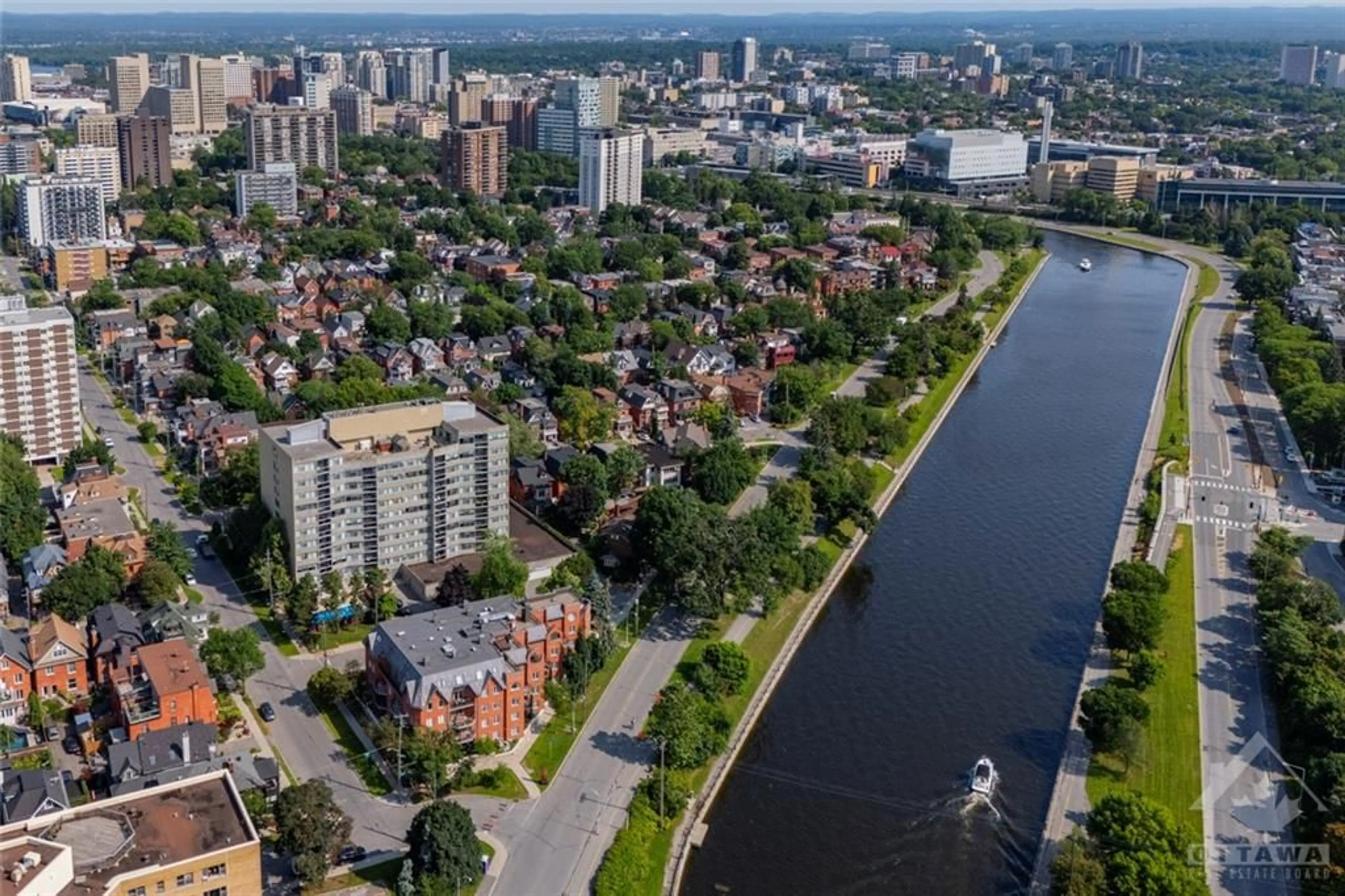 A pic from exterior of the house or condo, the view of city buildings for 60 MCLEOD St #403, Ottawa Ontario K2P 2G1