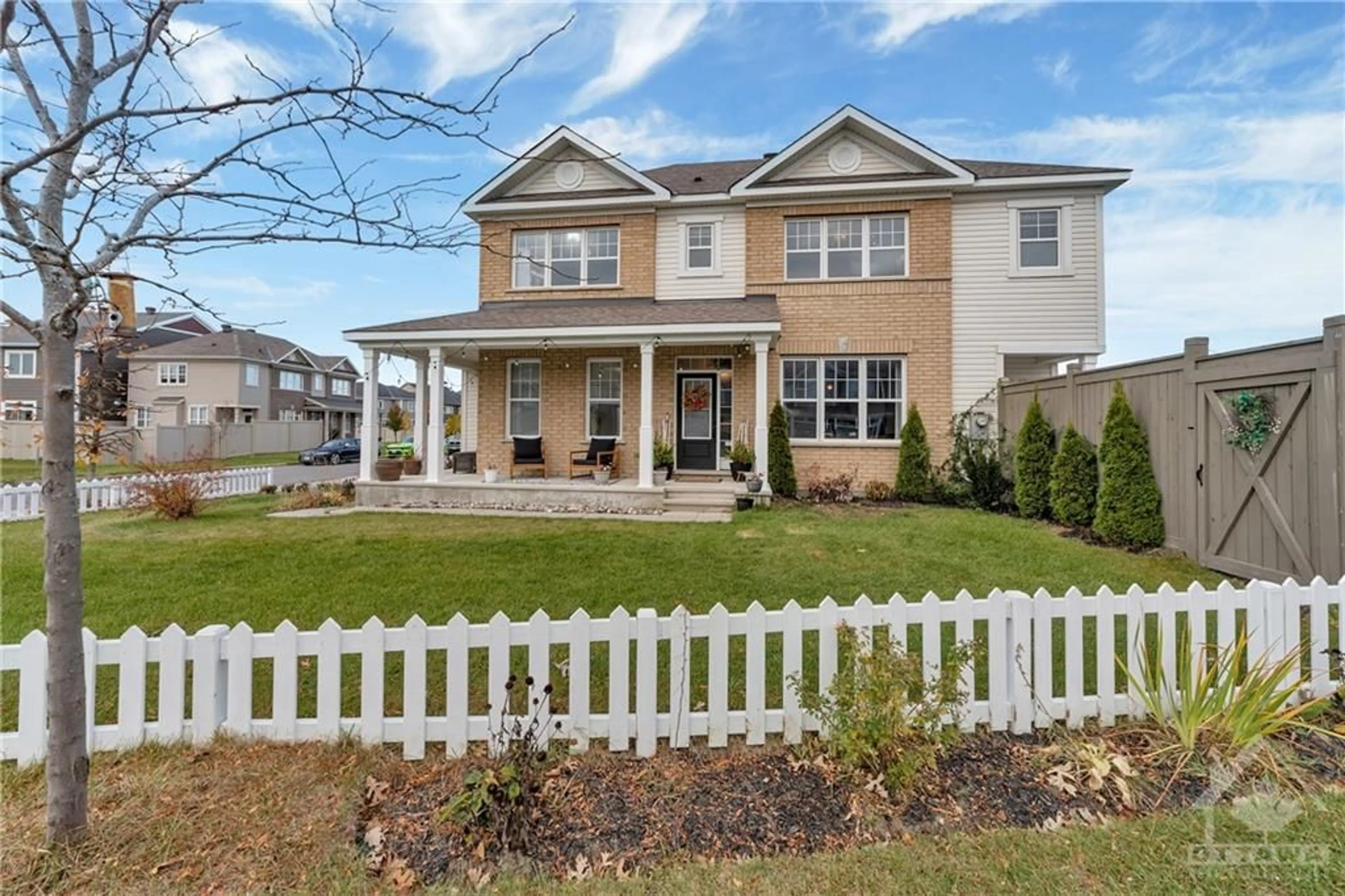 Frontside or backside of a home, the fenced backyard for 100 BURBOT St, Ottawa Ontario K2J 6J7