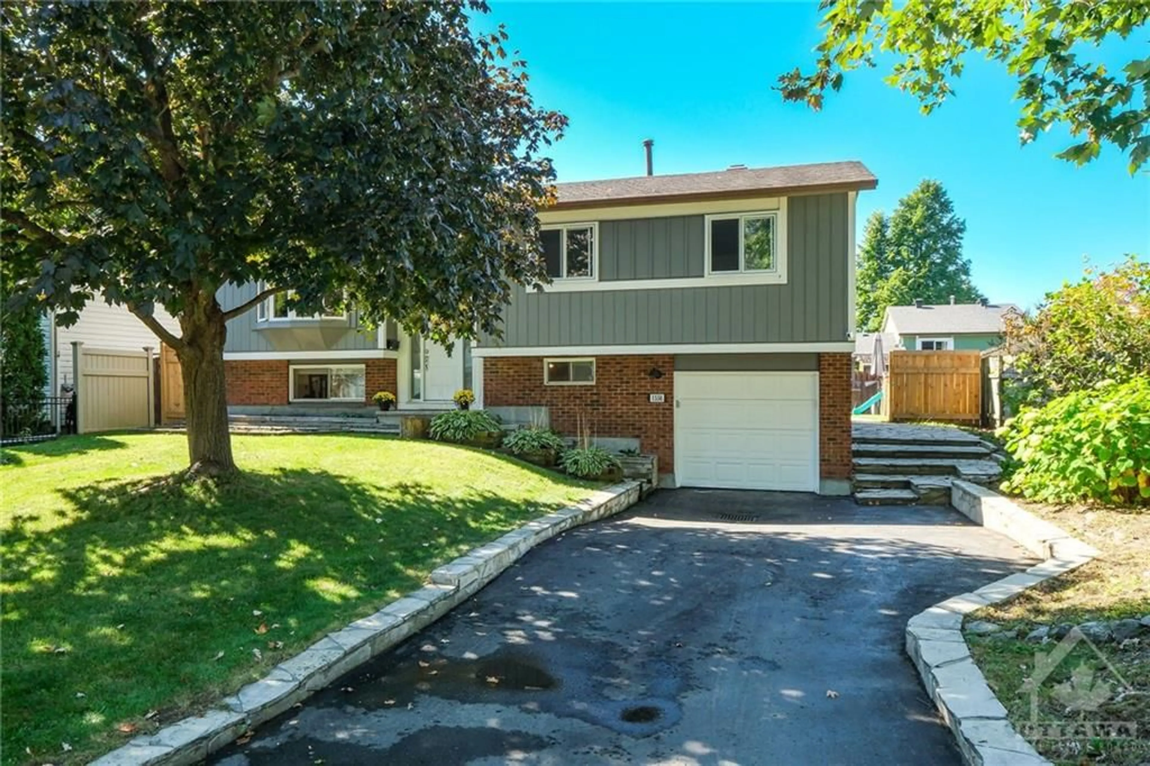 Frontside or backside of a home, the street view for 1556 PAYETTE Dr, Orleans Ontario K1E 1S9