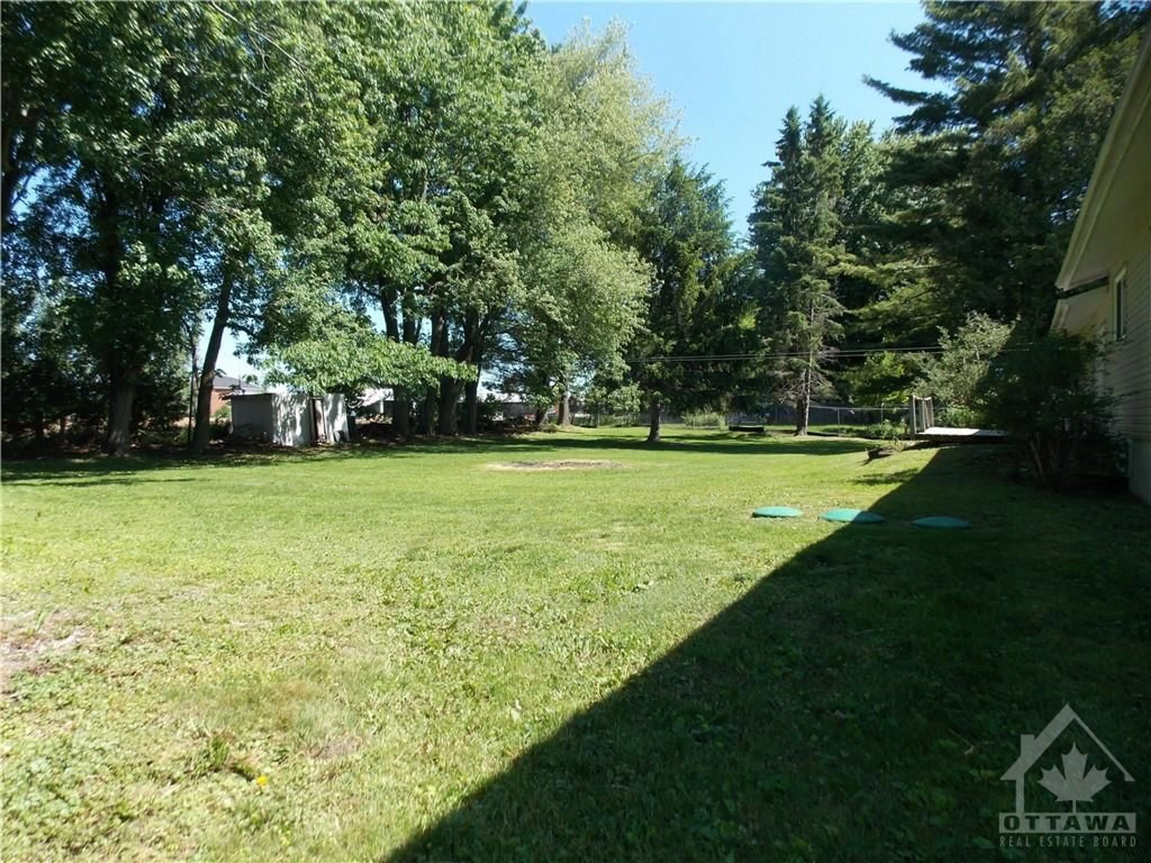 Patio, the fenced backyard for 10617 MAPLE St, South Mountain Ontario K0E 1W0