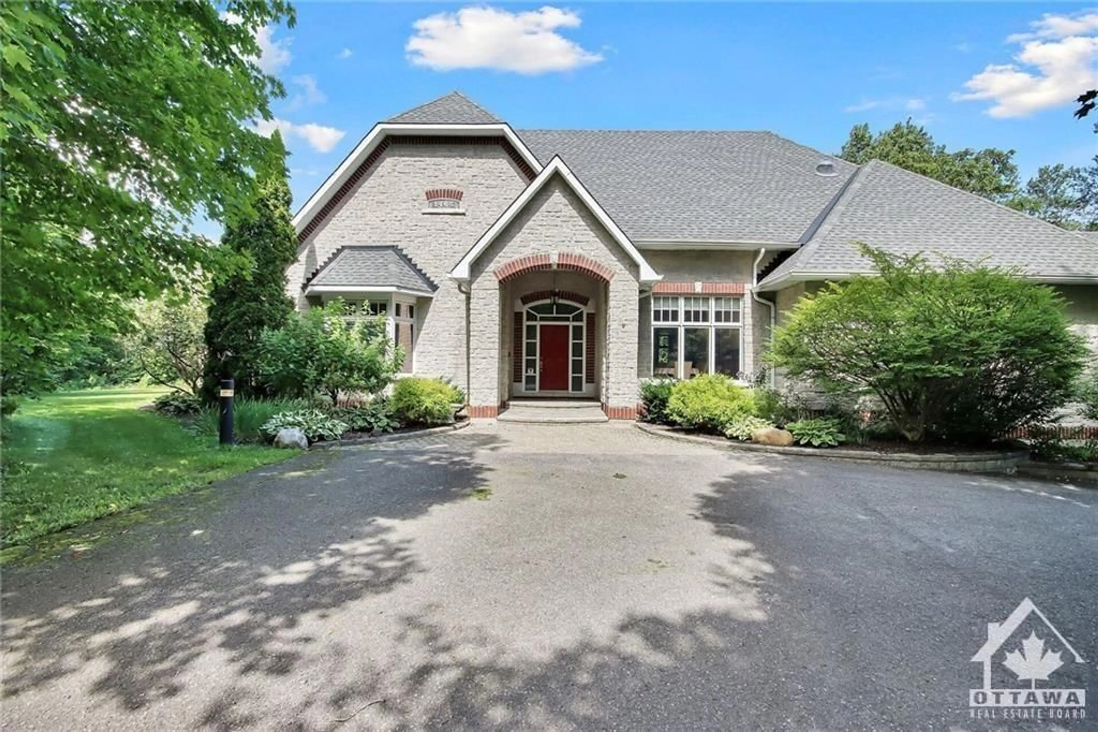 Frontside or backside of a home, cottage for 1465 SQUIRE Dr, Manotick Ontario K4M 1B8