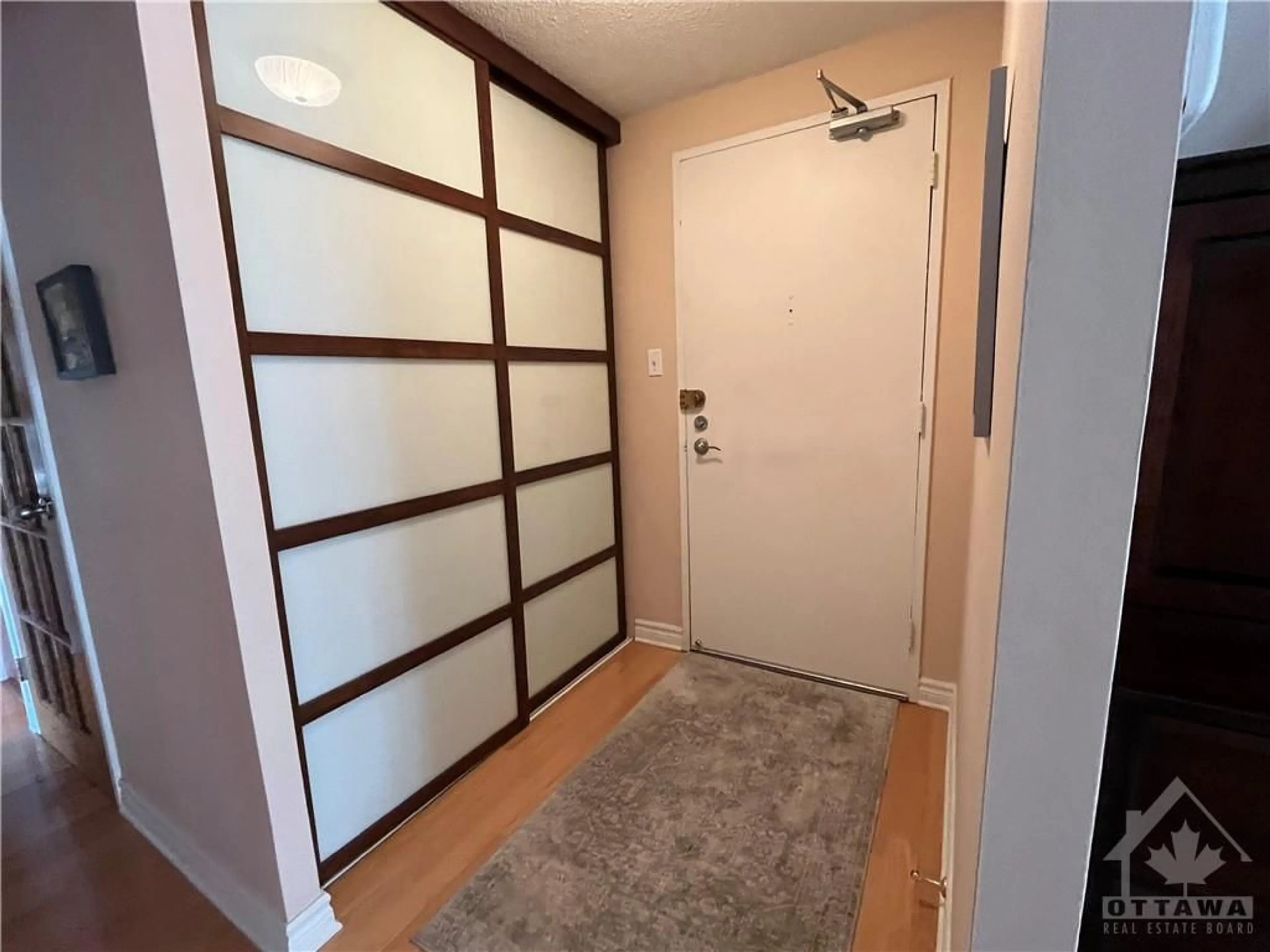 Indoor entryway, wood floors for 1171 AMBLESIDE Dr #1503, Ottawa Ontario K2B 8E1