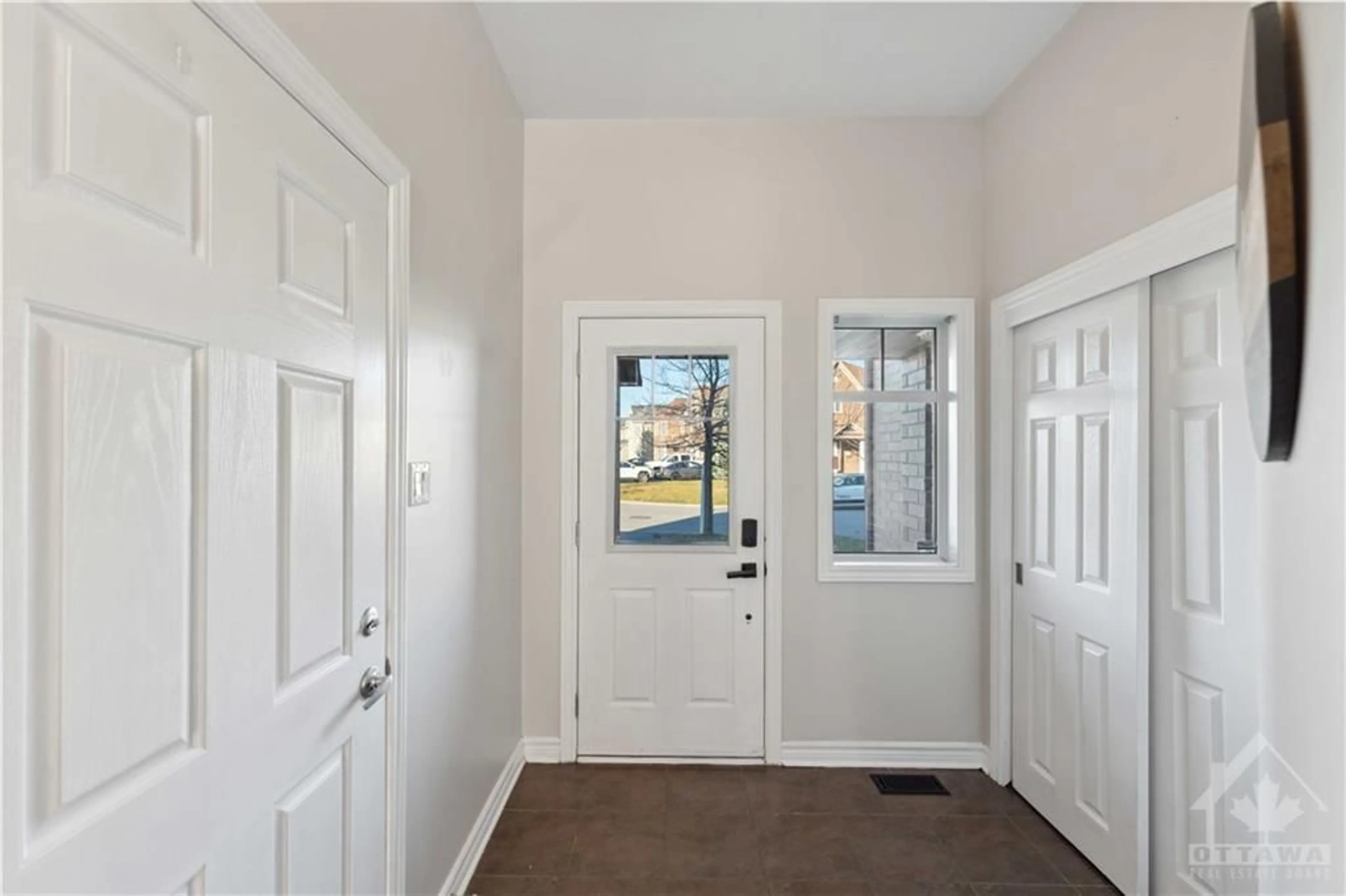 Indoor entryway, wood floors for 324 BALINROAN Cres, Ottawa Ontario K2J 3T7