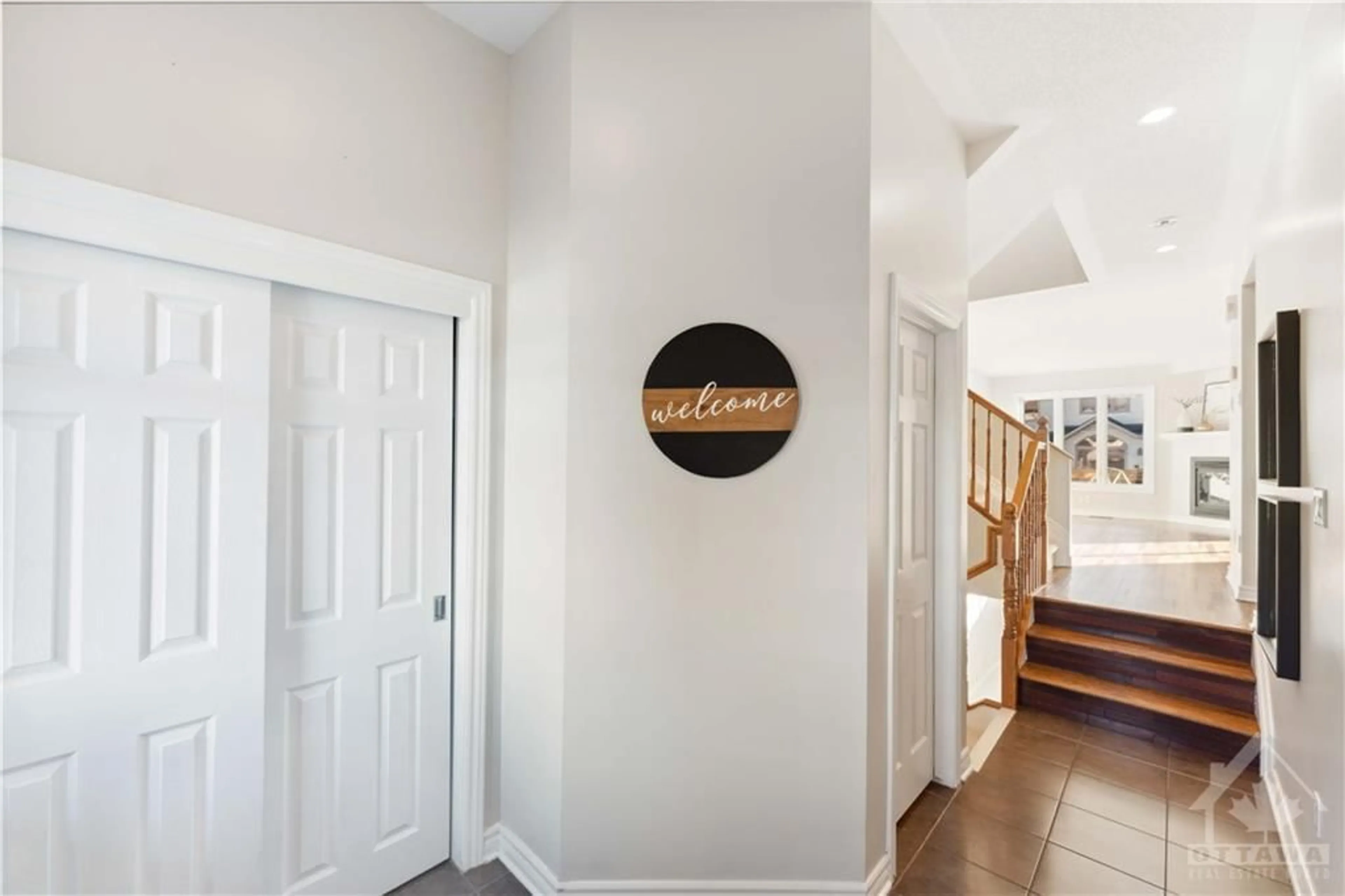 Indoor entryway, wood floors for 324 BALINROAN Cres, Ottawa Ontario K2J 3T7