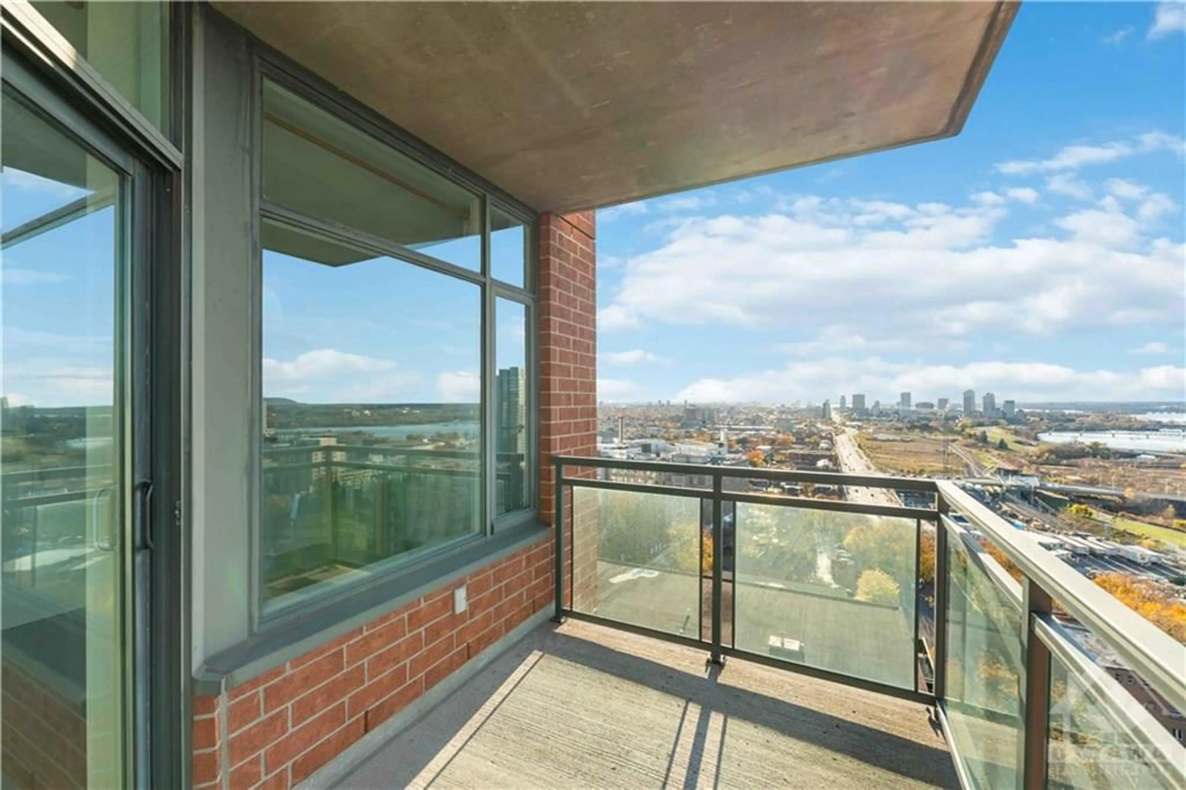 Balcony in the apartment, the view of city buildings for 570 LAURIER Ave #1802, Ottawa Ontario K1R 1C8