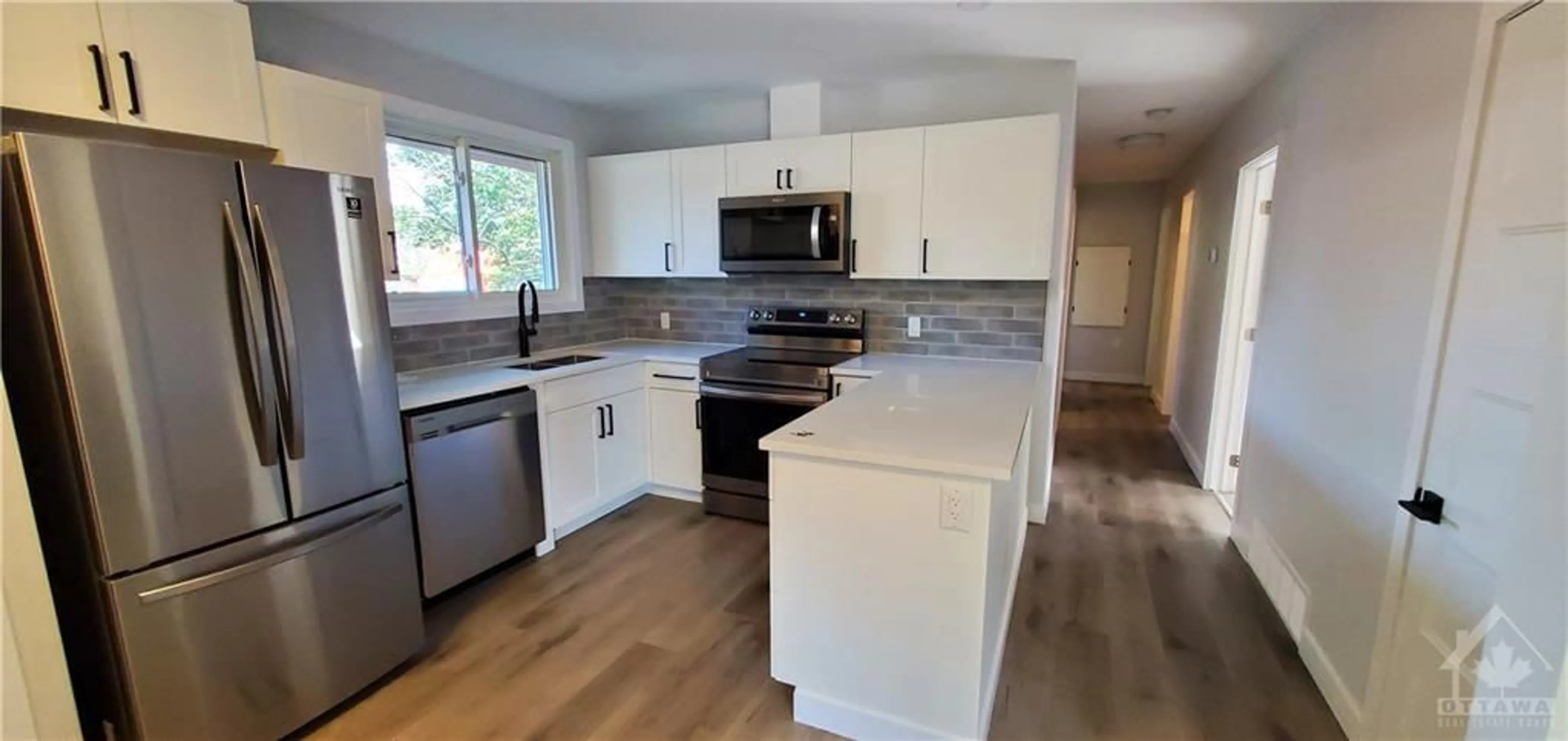 Open concept kitchen for 2300 ELMIRA Dr, Ottawa Ontario K2C 1H4