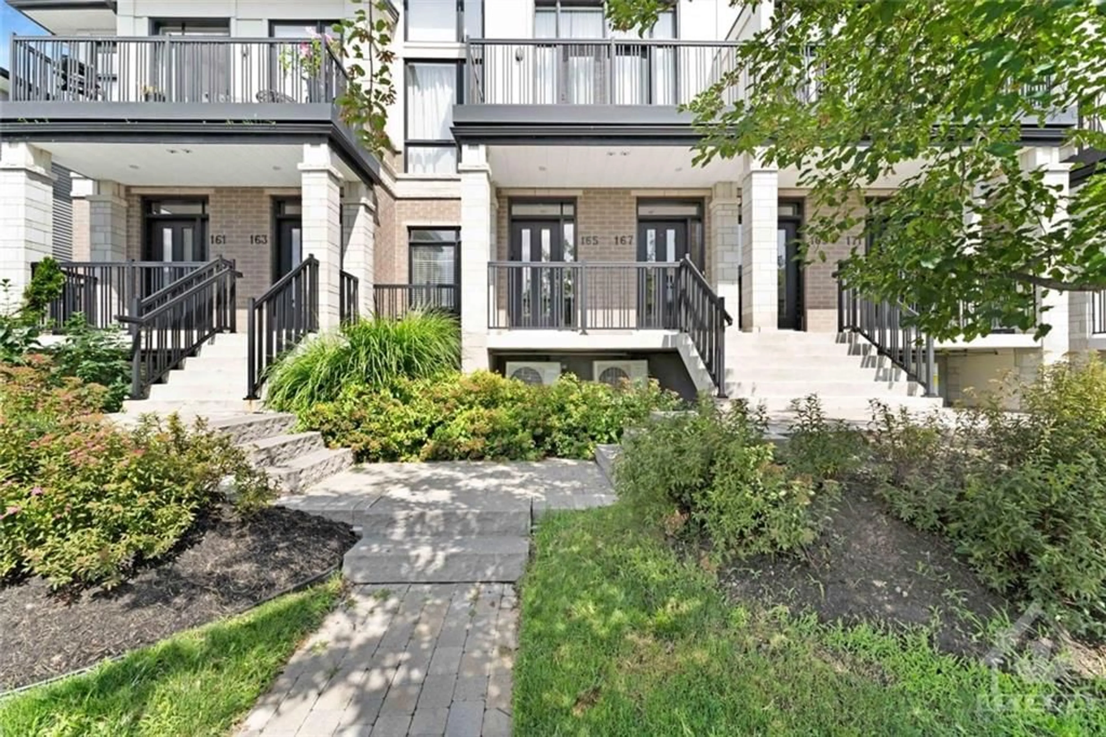 A pic from exterior of the house or condo, the street view for 165 POPLIN St, Manotick Ontario K4M 0G7