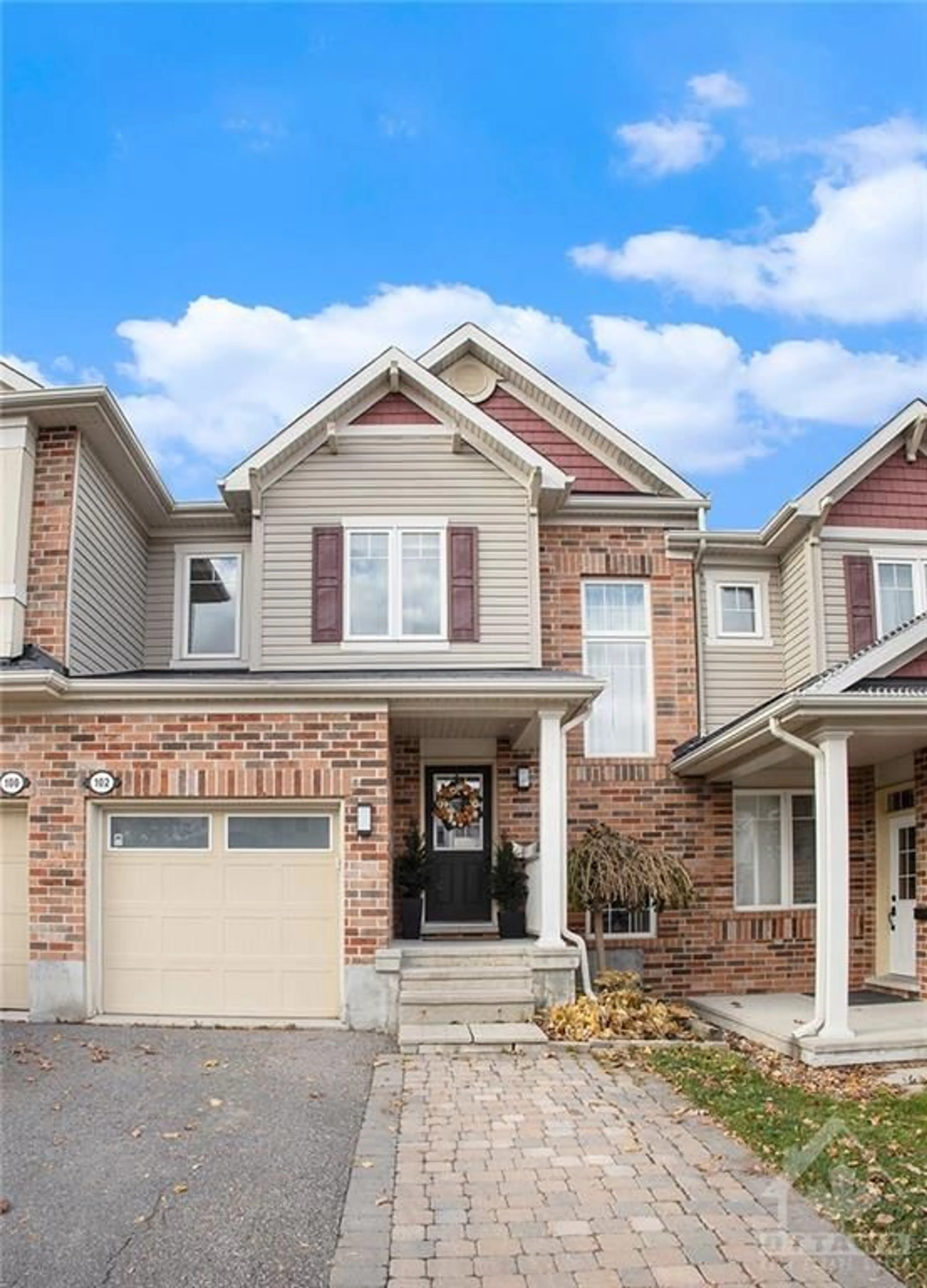 Home with brick exterior material for 102 PAR LA VILLE Cir, Ottawa Ontario K2S 0L7