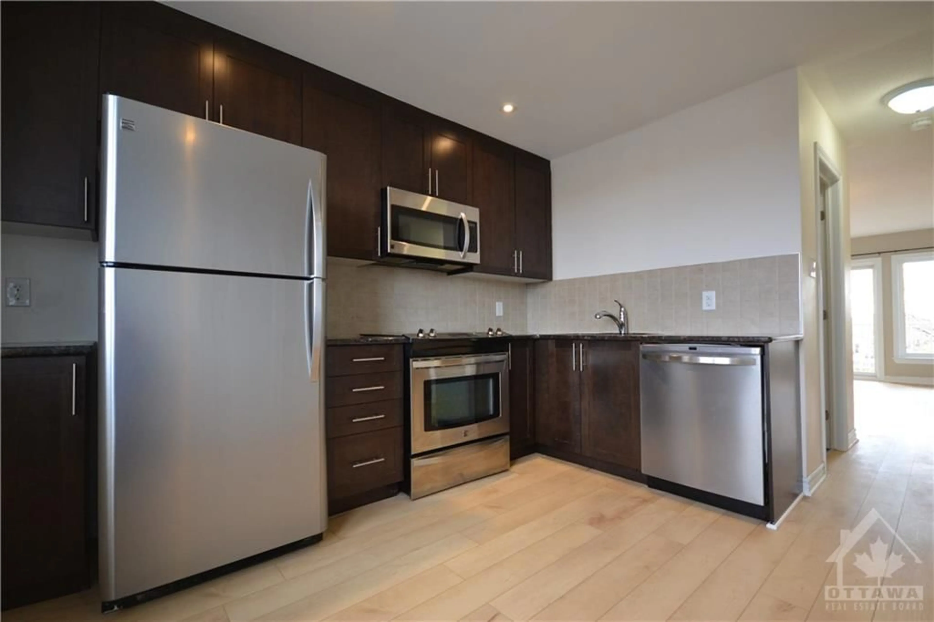 Standard kitchen, wood floors for 2545 LONGFIELDS Dr, Ottawa Ontario K2J 2L7