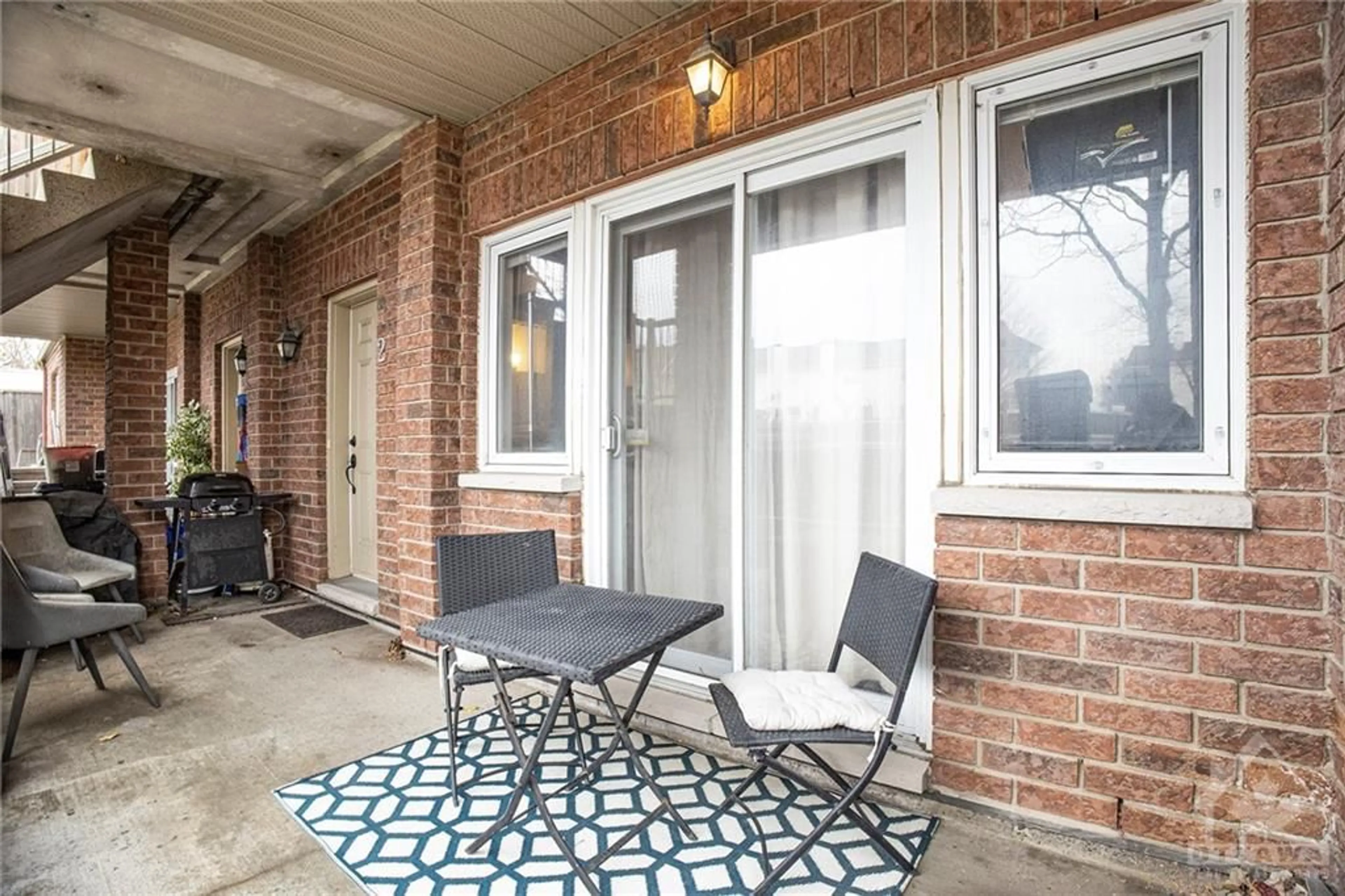 Patio, the fenced backyard for 165 WATERBRIDGE Dr #2, Ottawa Ontario K2G 7G3