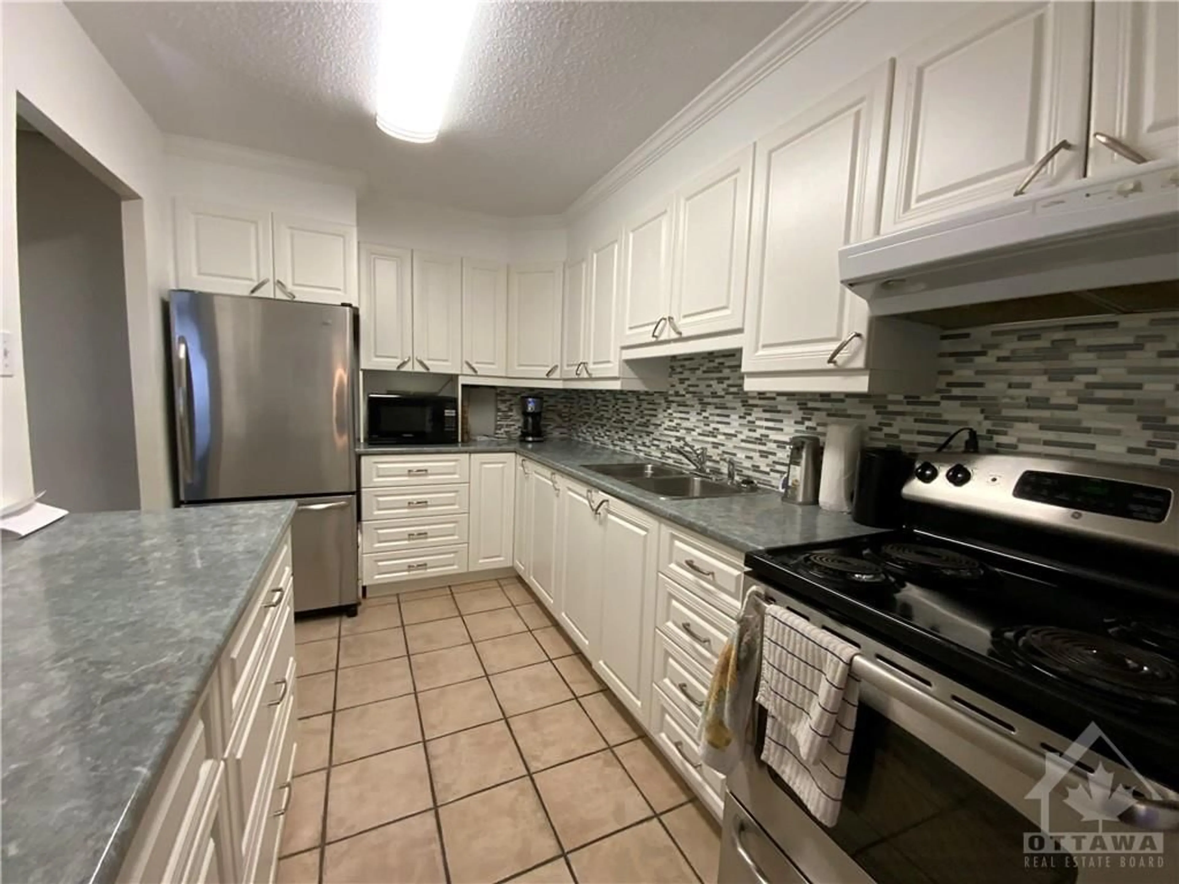 Kitchen, wood floors, cottage for 665 BATHGATE Dr #2008, Ottawa Ontario K1K 3Y4