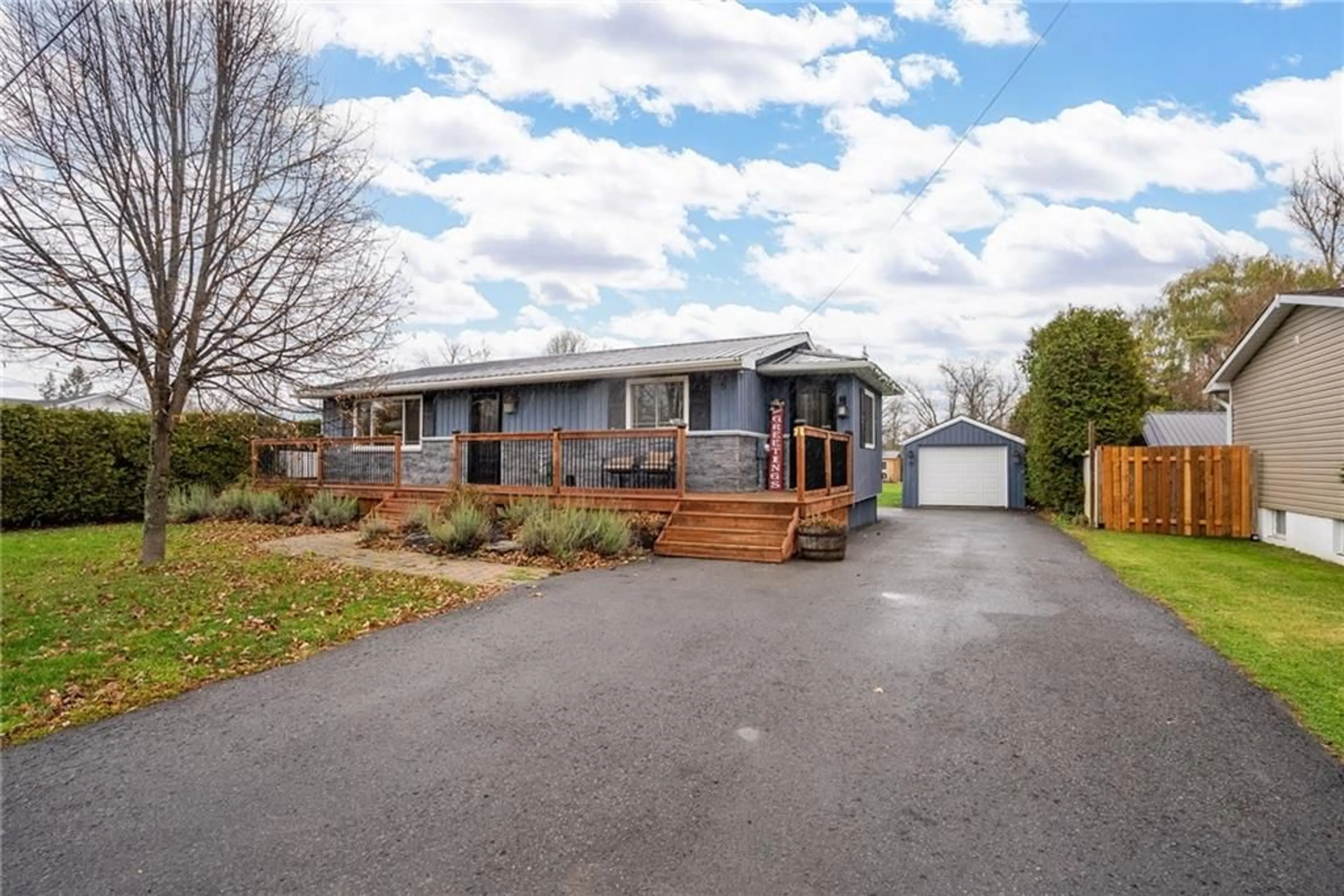 Frontside or backside of a home, the fenced backyard for 5 FRASER St, St Andrews West Ontario K0C 2A0