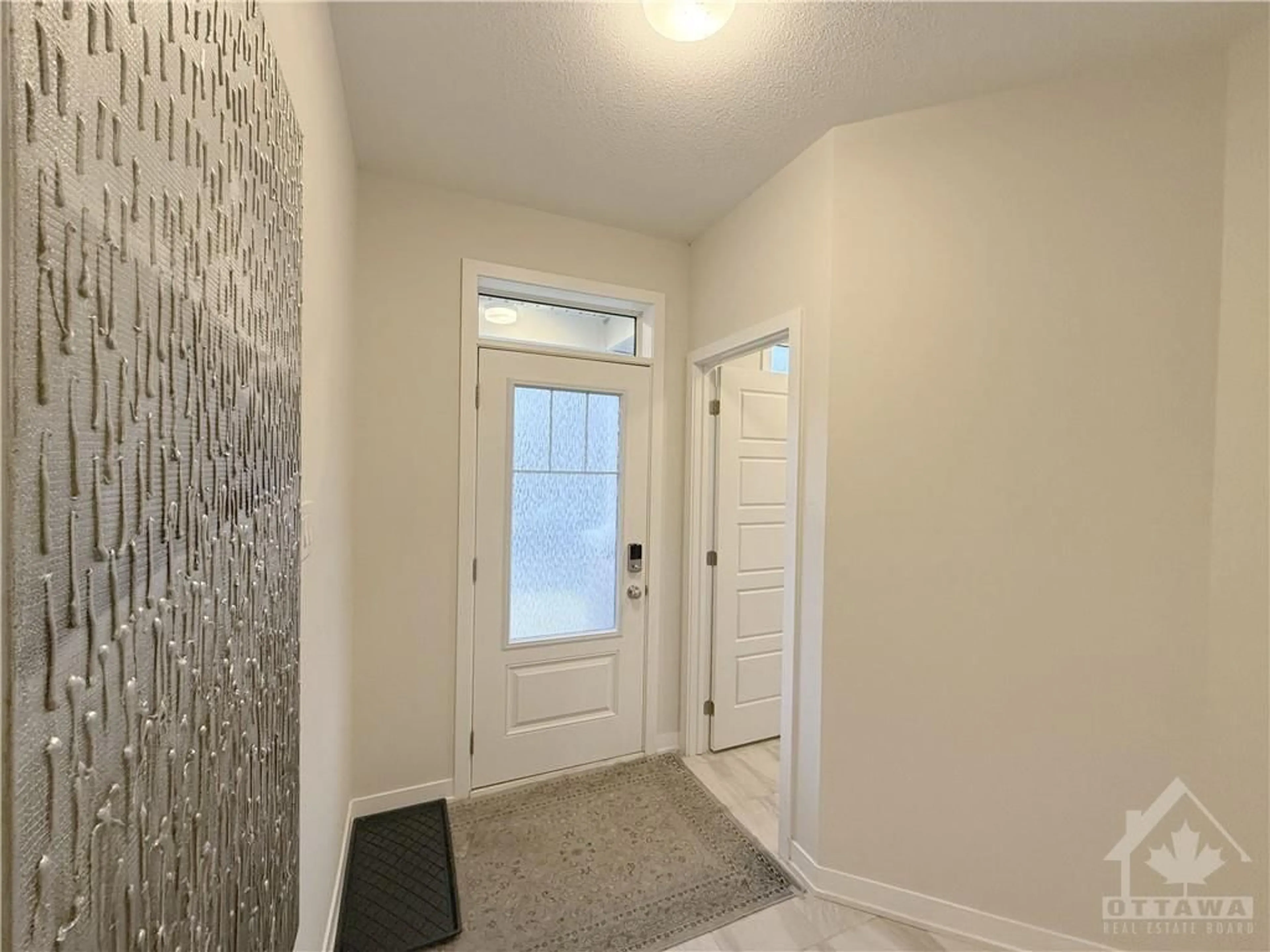 Indoor entryway, wood floors for 648 CYGNUS St, Ottawa Ontario K2J 7B2