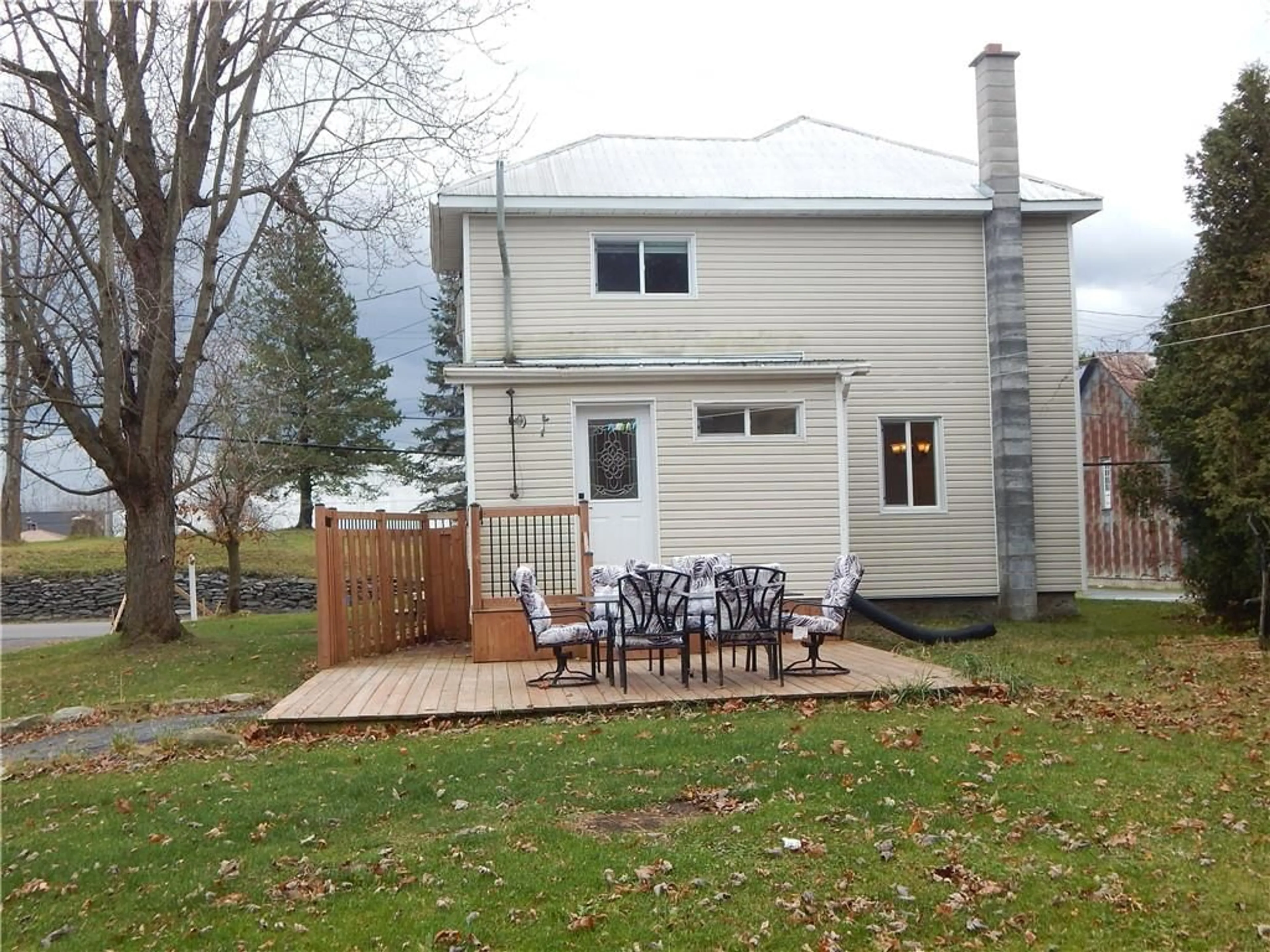 Patio, the fenced backyard for 17337 COUNTY RD 18 Rd, St Andrews West Ontario K0C 2A0