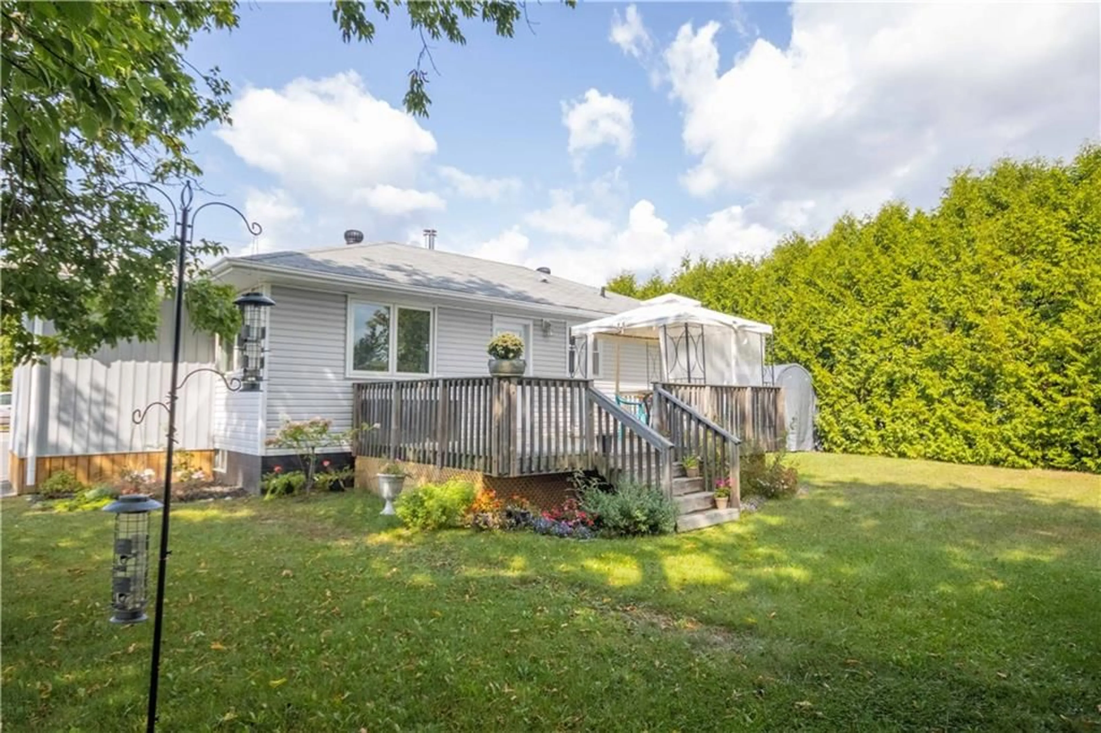 Frontside or backside of a home, the fenced backyard for 52 PAUGH LAKE Rd, Barry's Bay Ontario K0J 1B0