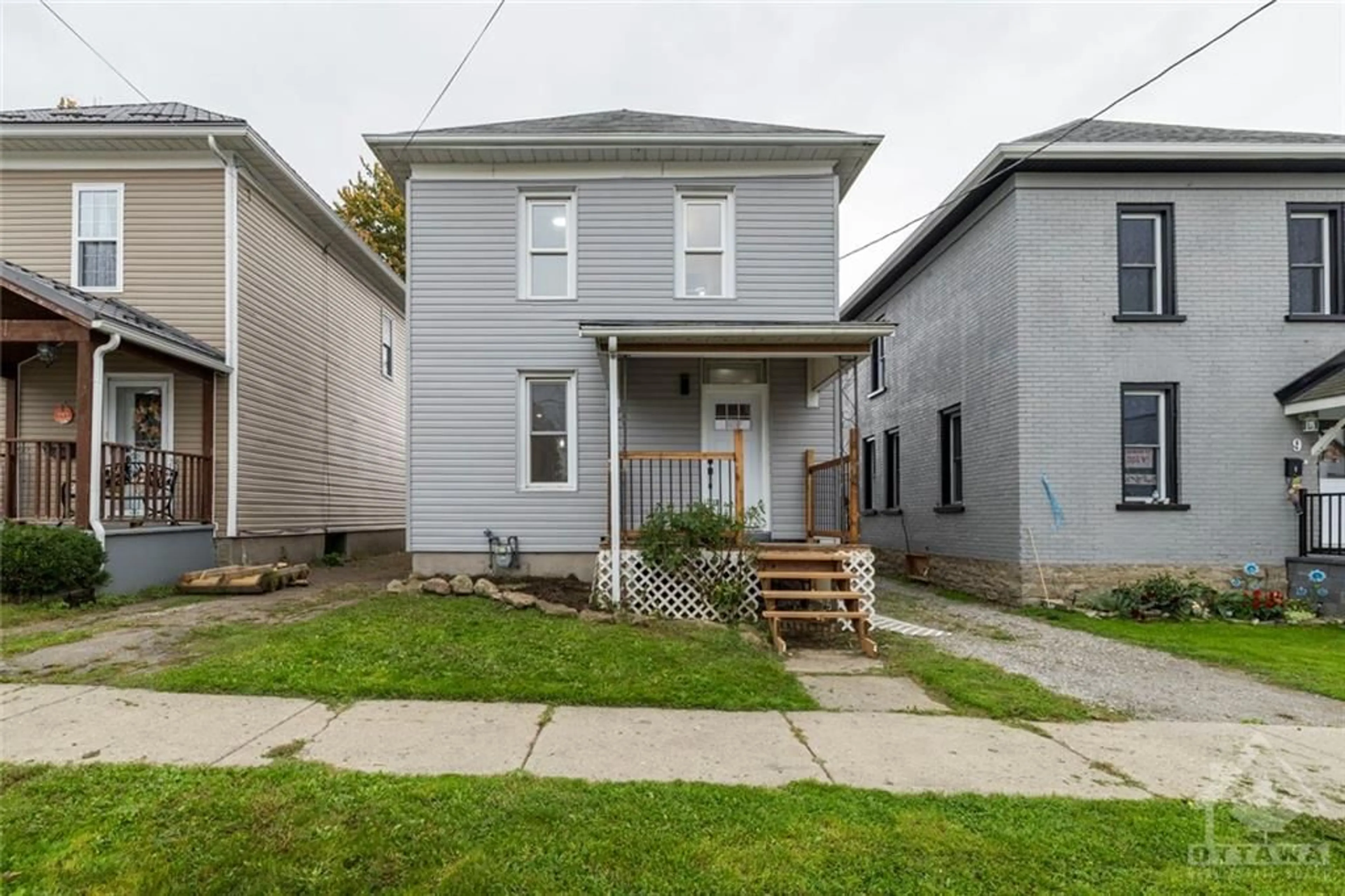 Frontside or backside of a home, the fenced backyard for 11 KENT St, Smiths Falls Ontario K7A 1B5