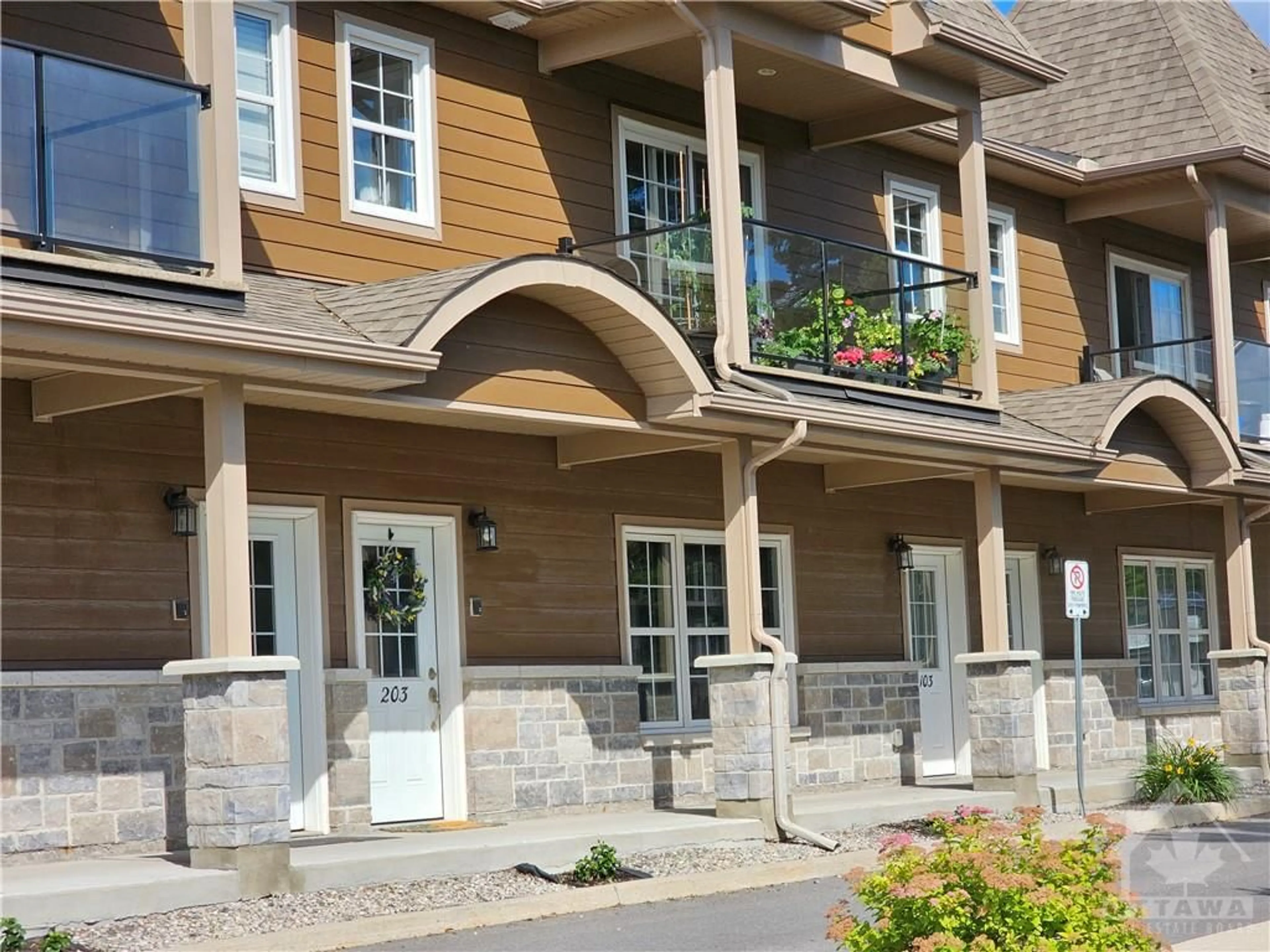 A pic from exterior of the house or condo, the front or back of building for 245 EQUINOX Dr #203, Embrun Ontario K0A 1W1