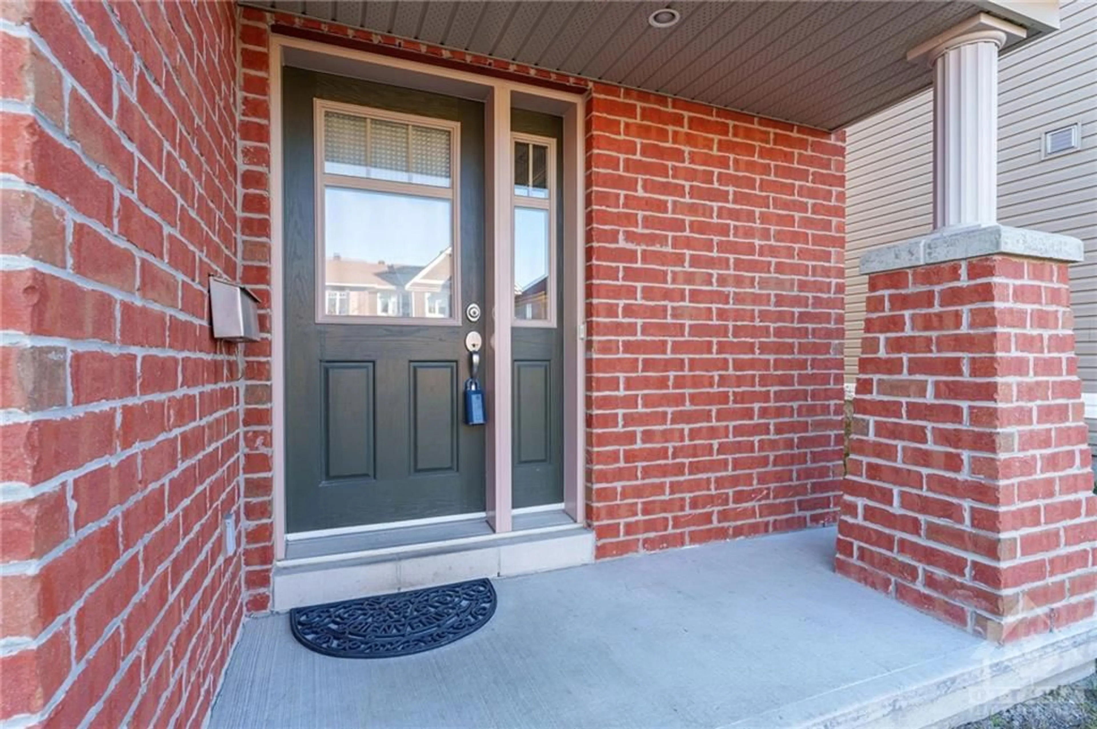 Home with brick exterior material for 313 RAVENSWOOD Way, Ottawa Ontario K4A 0R9