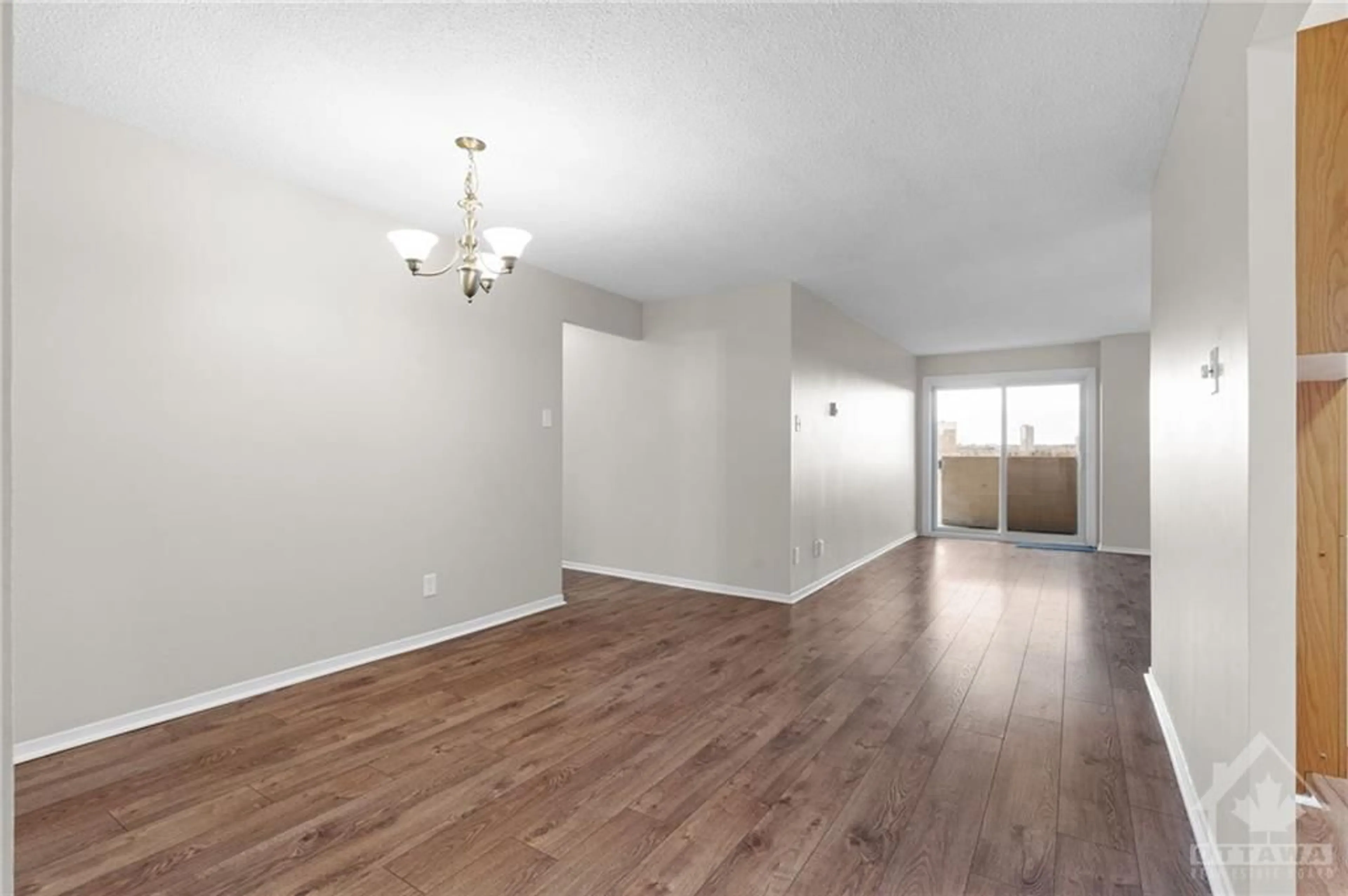 A pic of a room, wood floors for 158C MCARTHUR Ave #709, Ottawa Ontario K1L 8E7