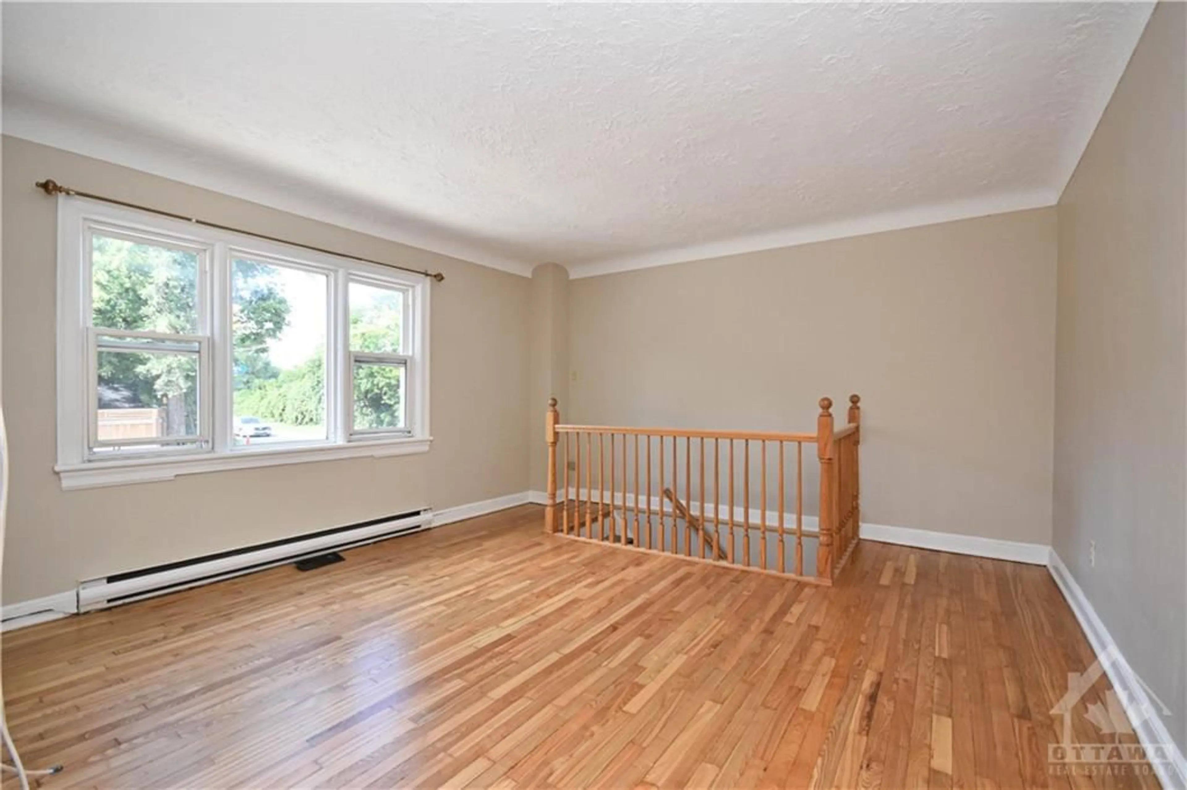 A pic of a room, wood floors for 55 GLENDALE Ave, Ottawa Ontario K1S 1W3