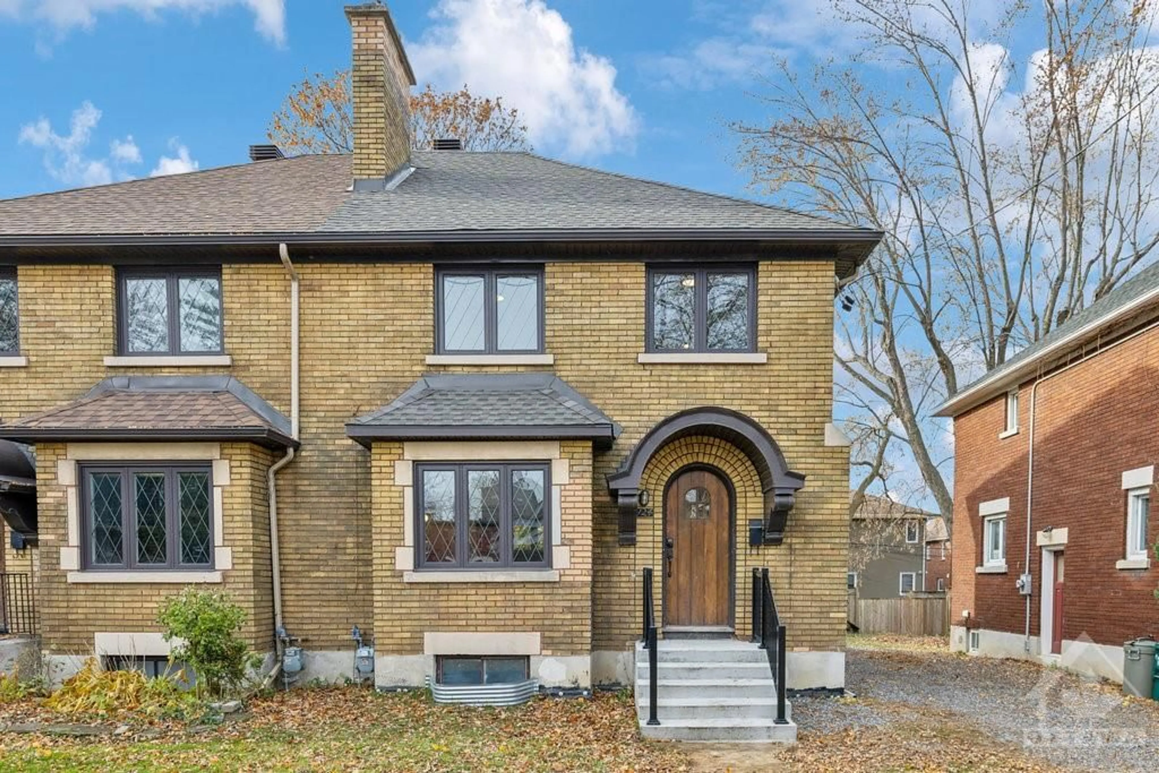 Home with brick exterior material for 124 BLACKBURN Ave, Ottawa Ontario K1N 8A7