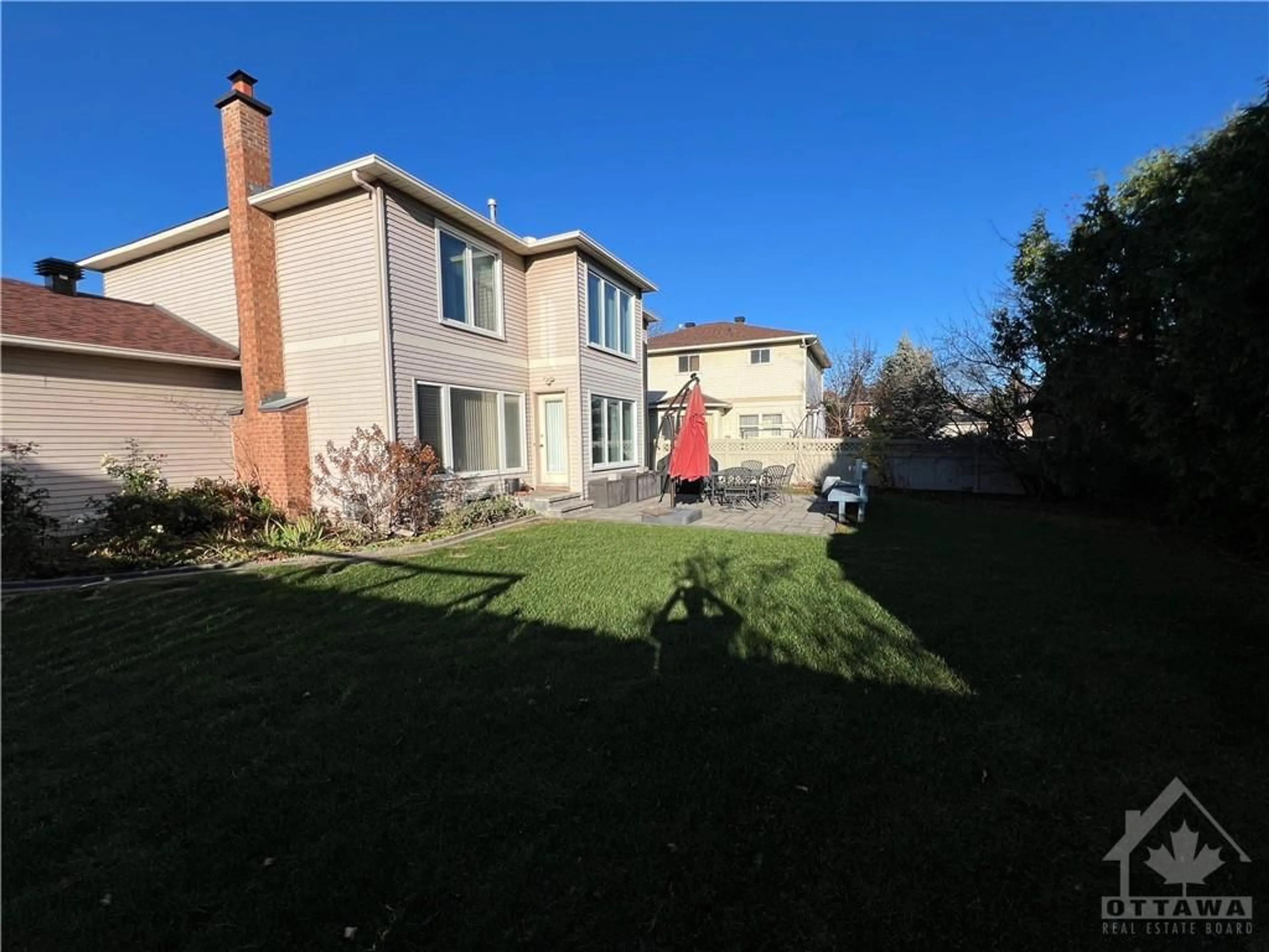 Frontside or backside of a home, the fenced backyard for 1307 TURNER Cres, Ottawa Ontario K1E 2Y5