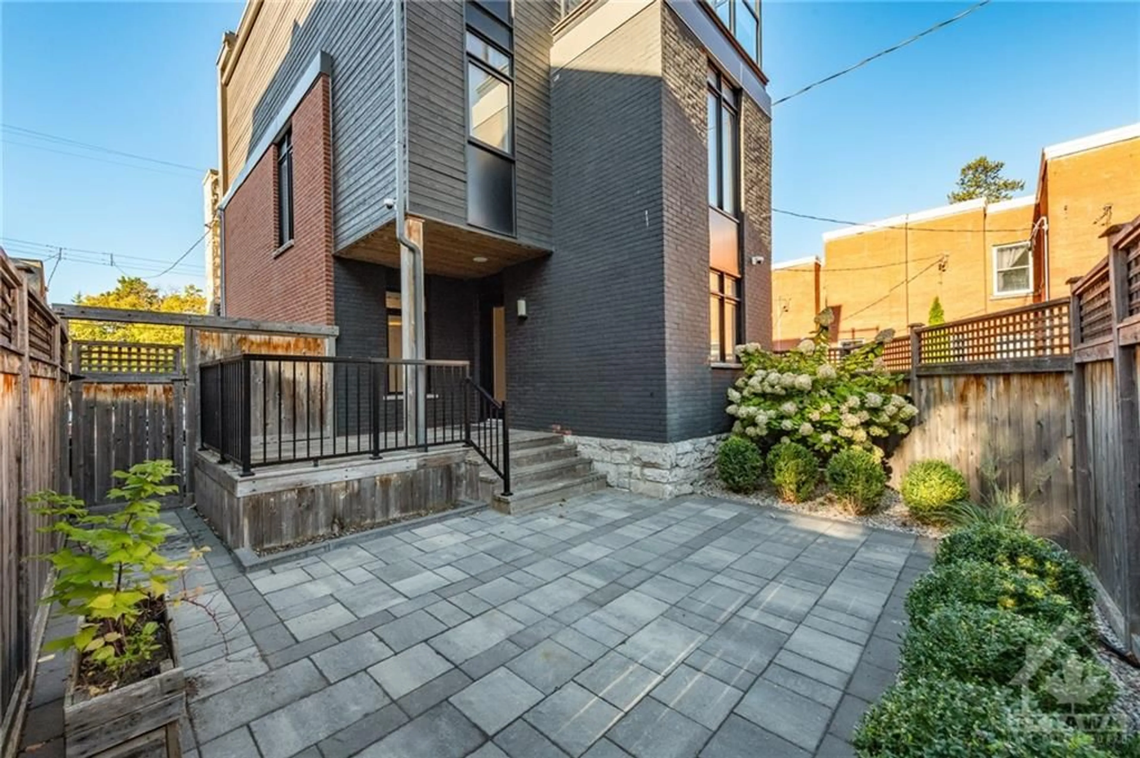 Patio, the fenced backyard for 16 FIRST Ave, Ottawa Ontario K1S 2G2