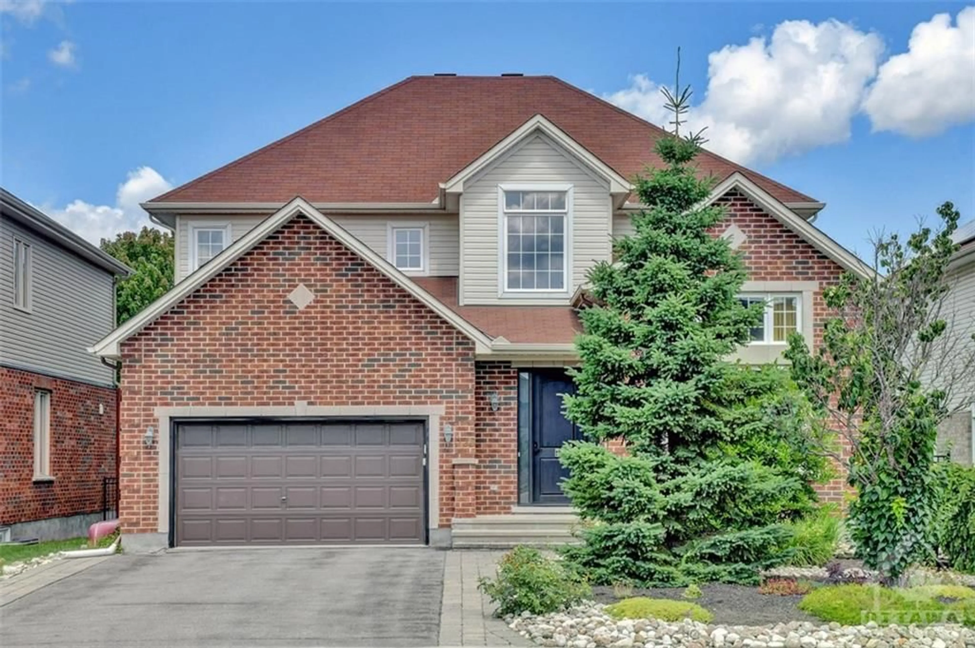 Home with brick exterior material for 135 RIVERSEDGE Cres, Ottawa Ontario K1V 0Z8