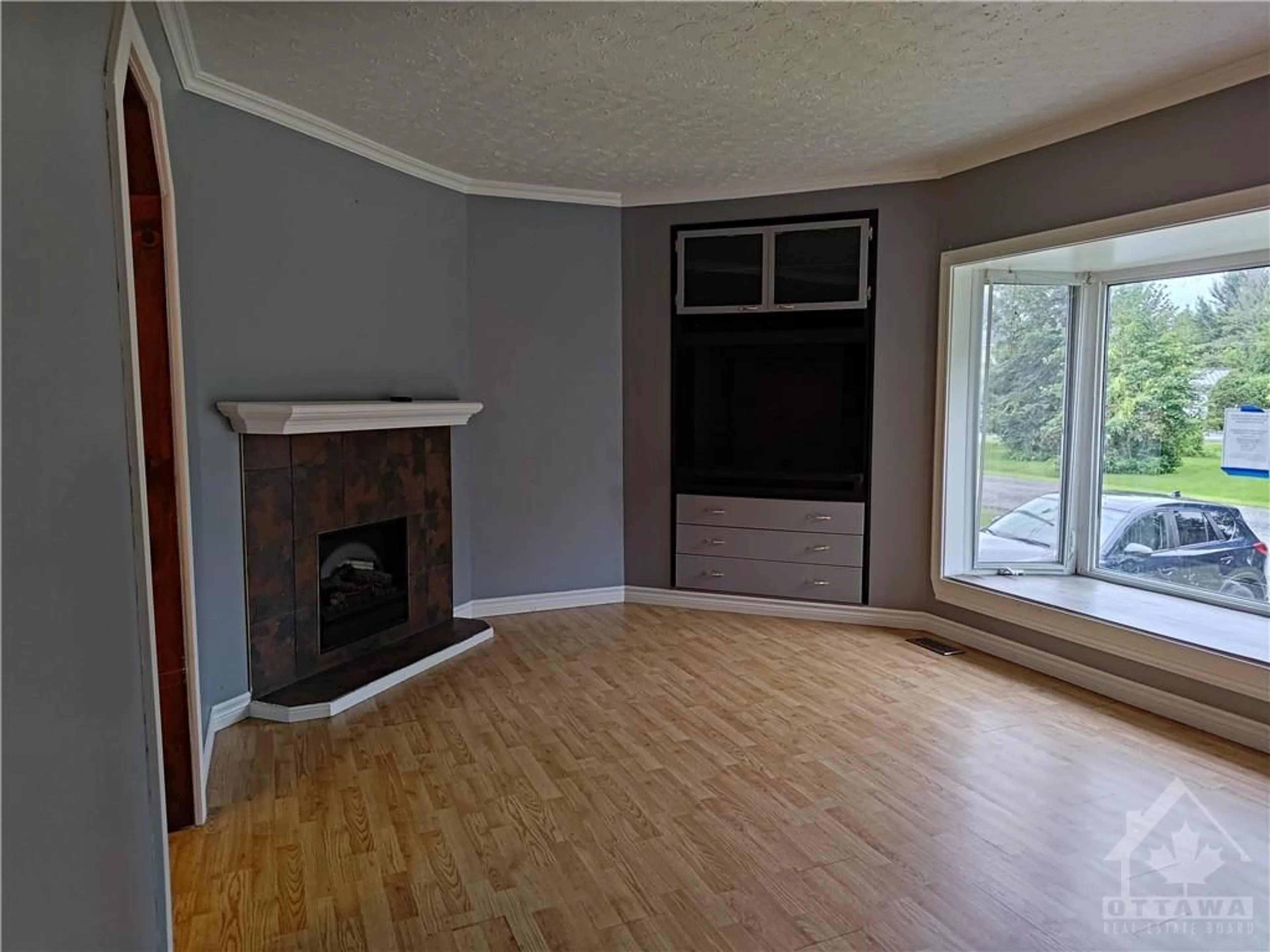 A pic of a room, wood floors for 1517 MAYRENE Cres, Ottawa Ontario K4P 1B2