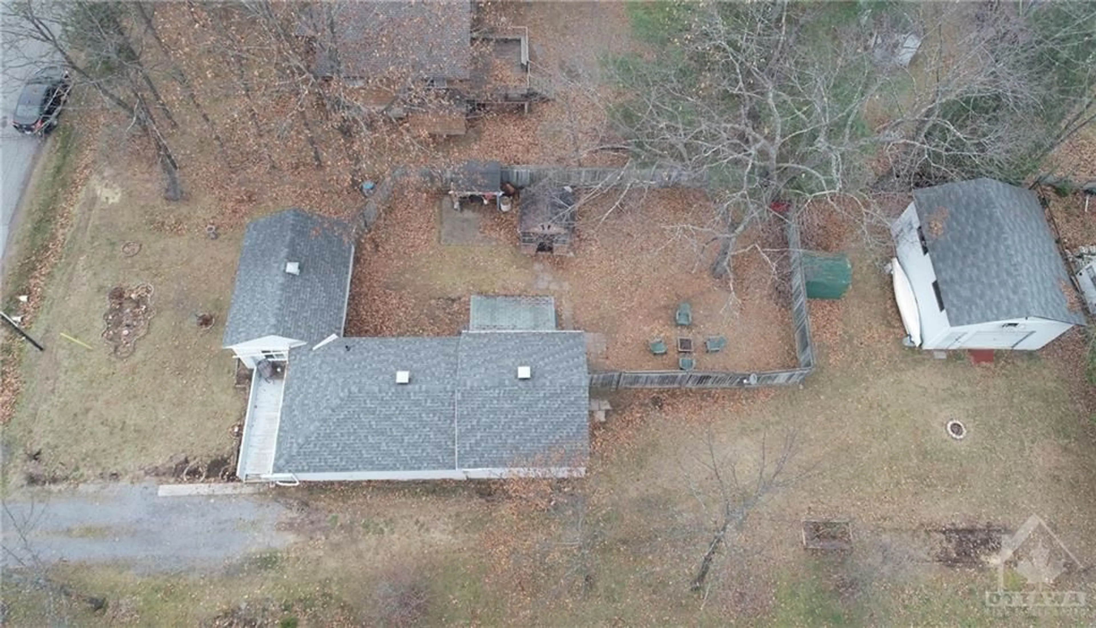 Frontside or backside of a home, the fenced backyard for 156 SUNNING HILLS Cres, Ottawa Ontario K0A 3M0