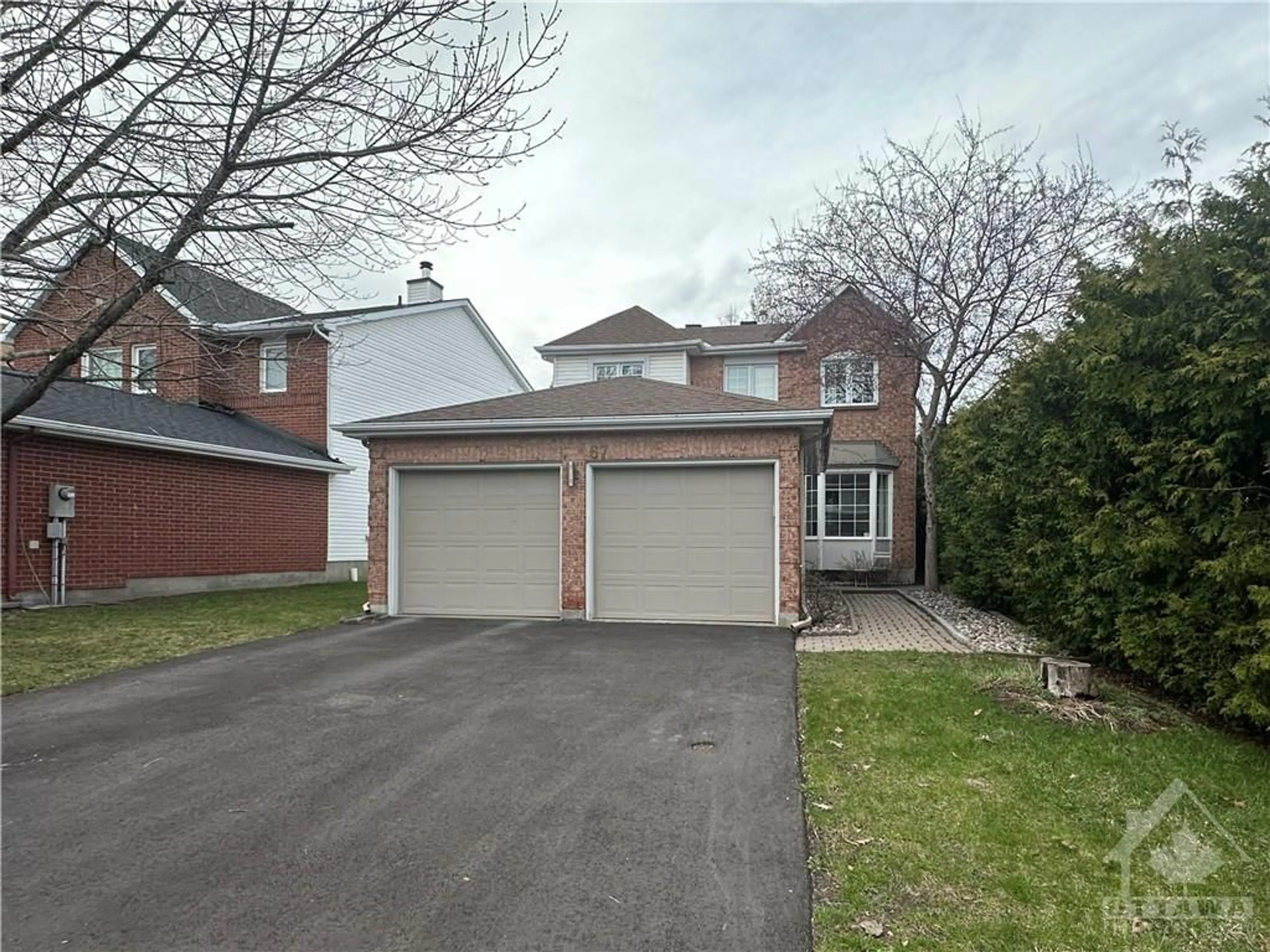 Frontside or backside of a home, the street view for 67 BEACON Way, Ottawa Ontario K2K 2R4