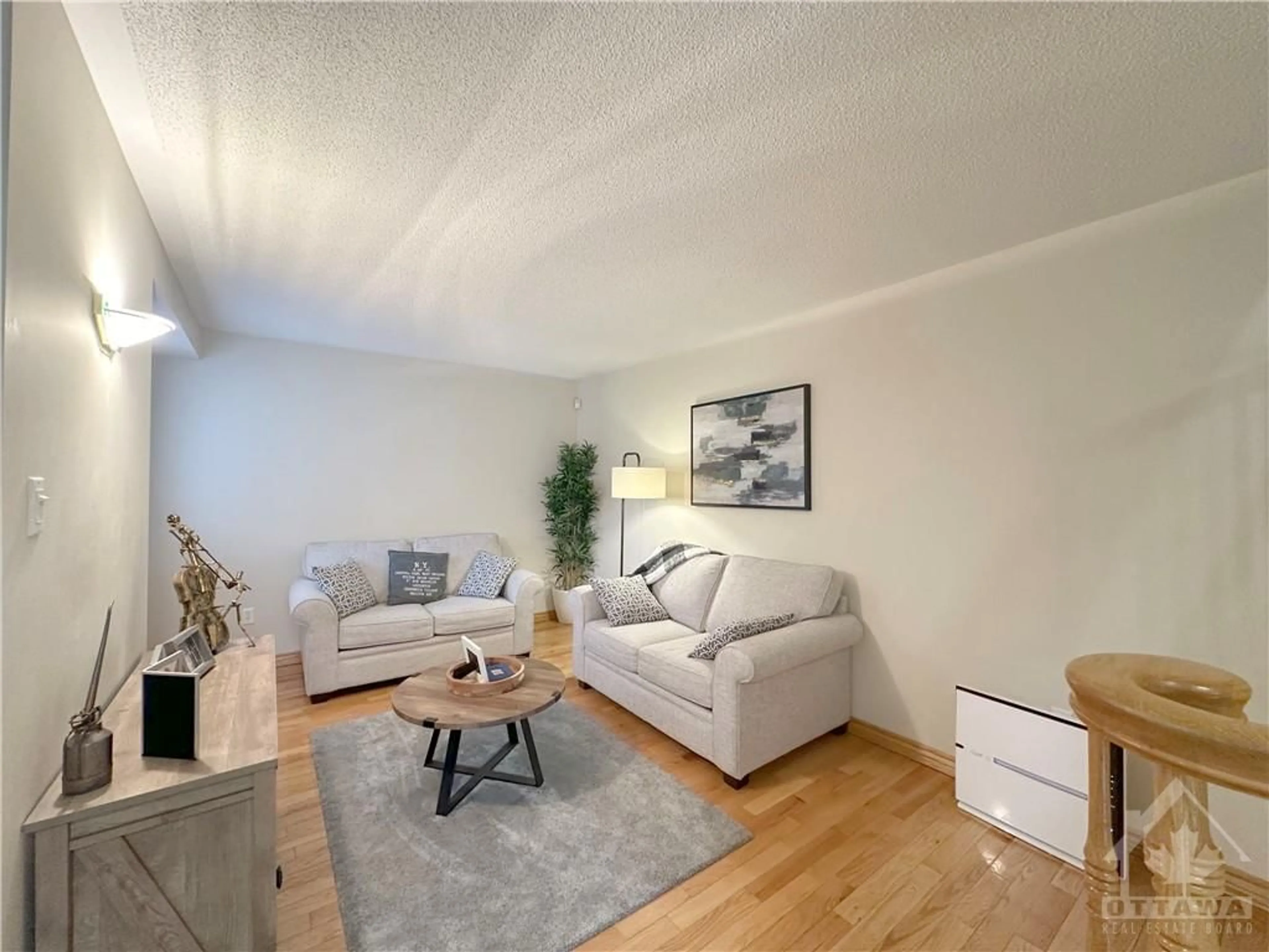 Living room, wood floors for 67 BEACON Way, Ottawa Ontario K2K 2R4