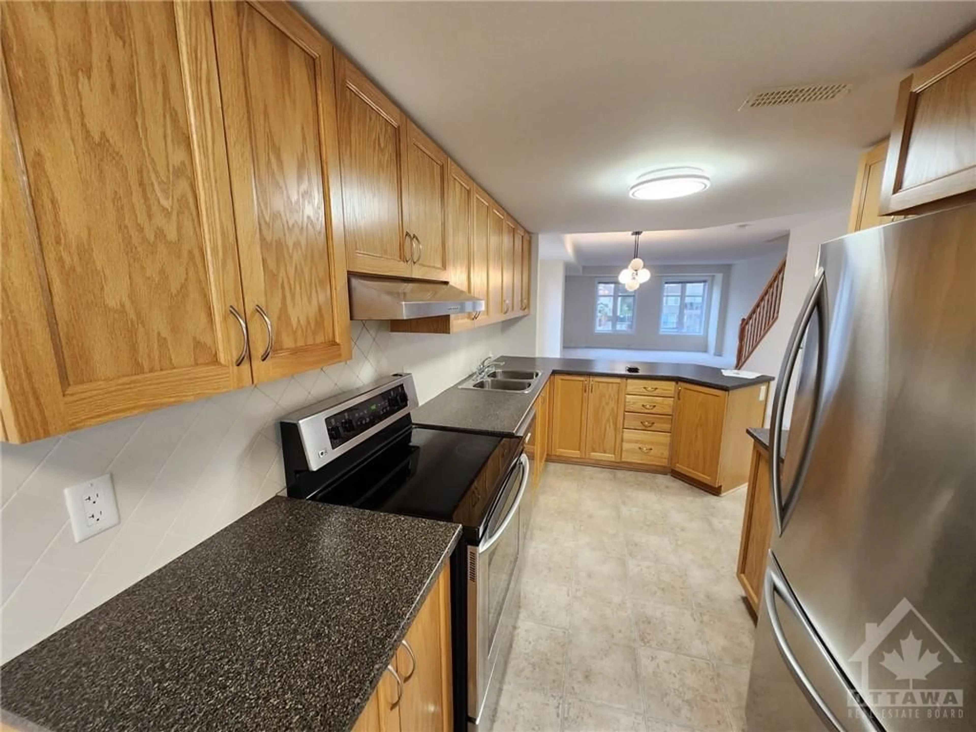 Standard kitchen, wood floors, cottage for 750 CHAPMAN MILLS Dr #B, Ottawa Ontario K2J 3V2