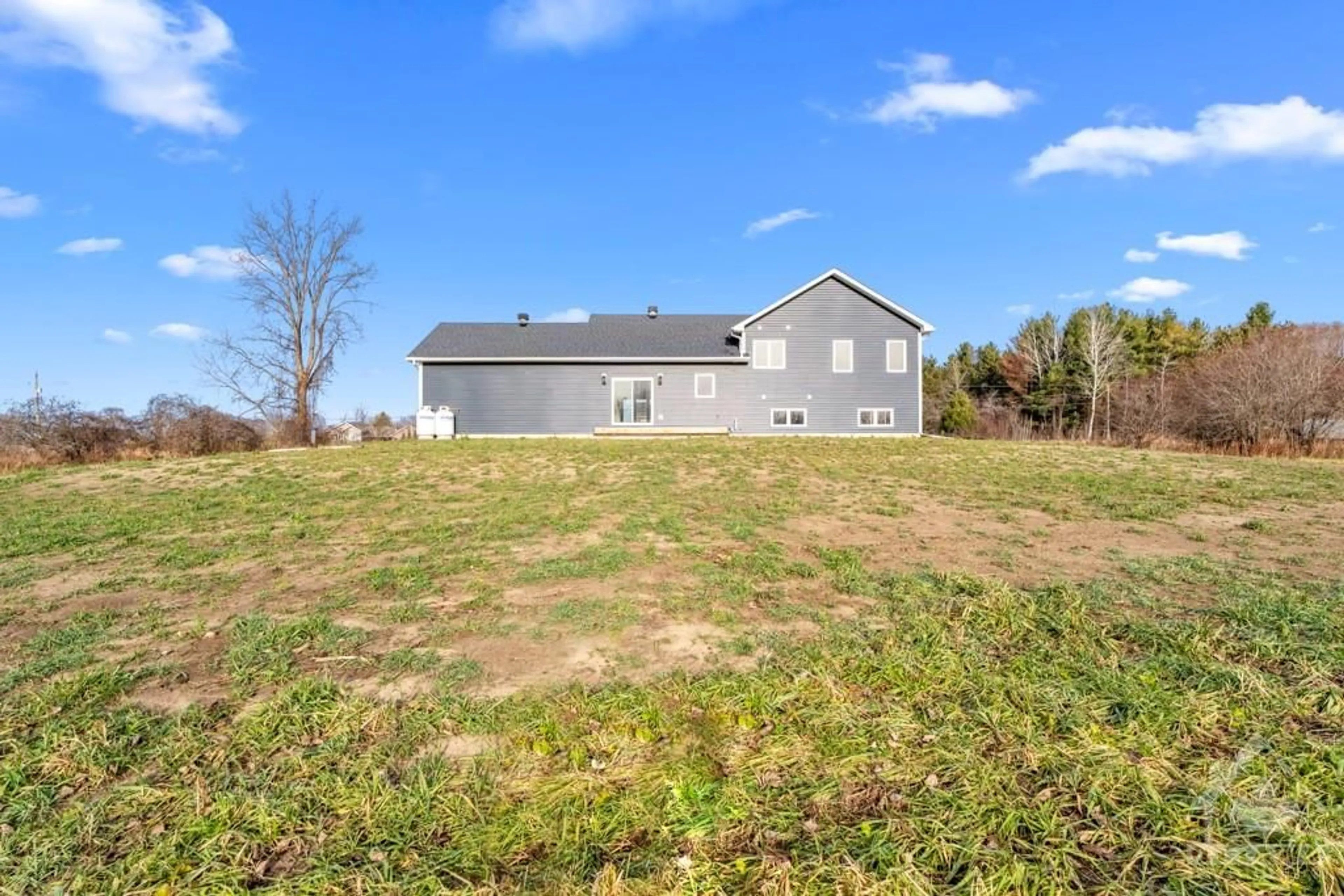 A pic from exterior of the house or condo, the fenced backyard for 10076 NATION RIVER Rd, South Mountain Ontario K0E 1W0