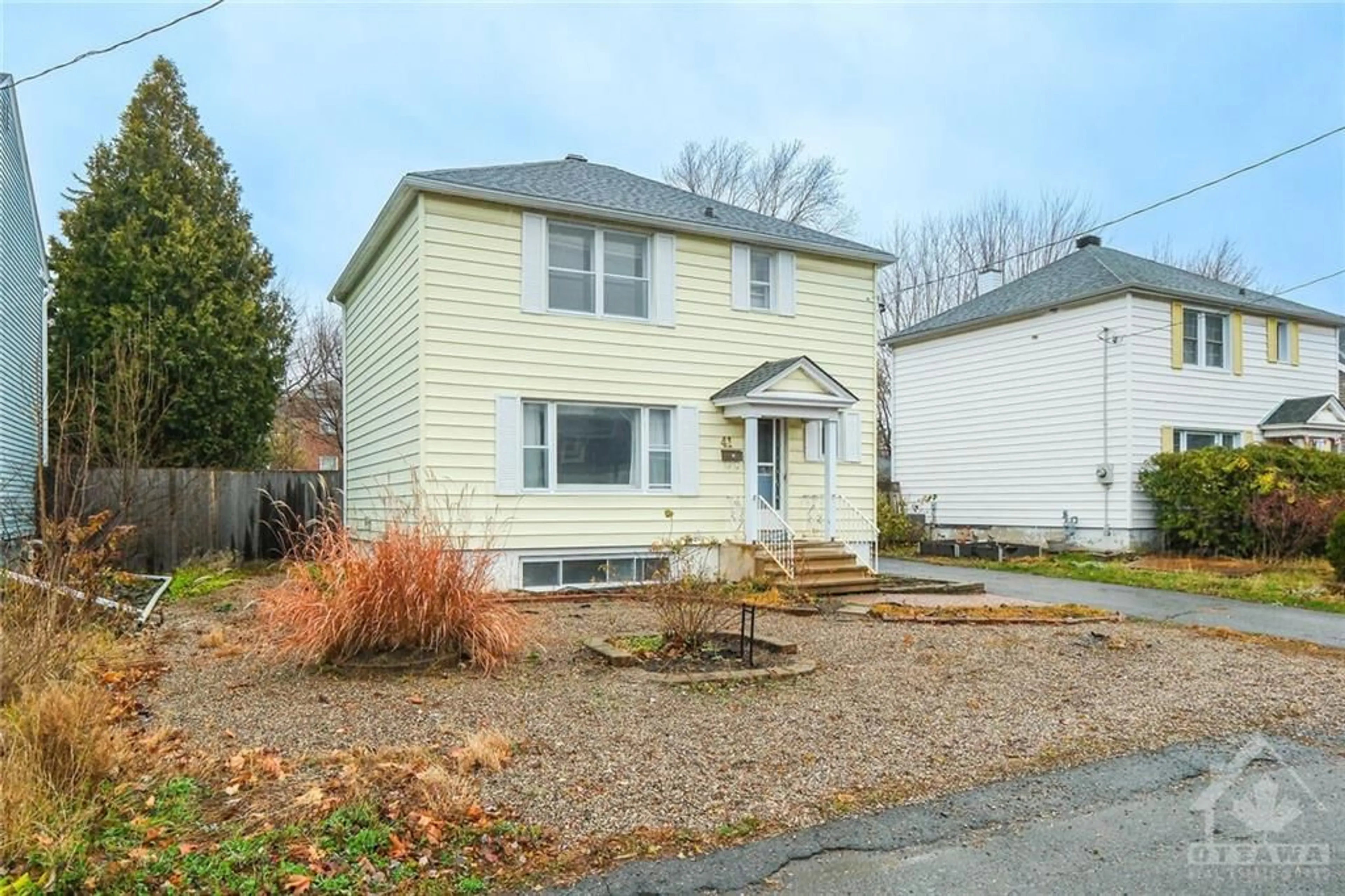 Frontside or backside of a home, the fenced backyard for 41 COLUMBUS Ave, Ottawa Ontario K1K 1R2