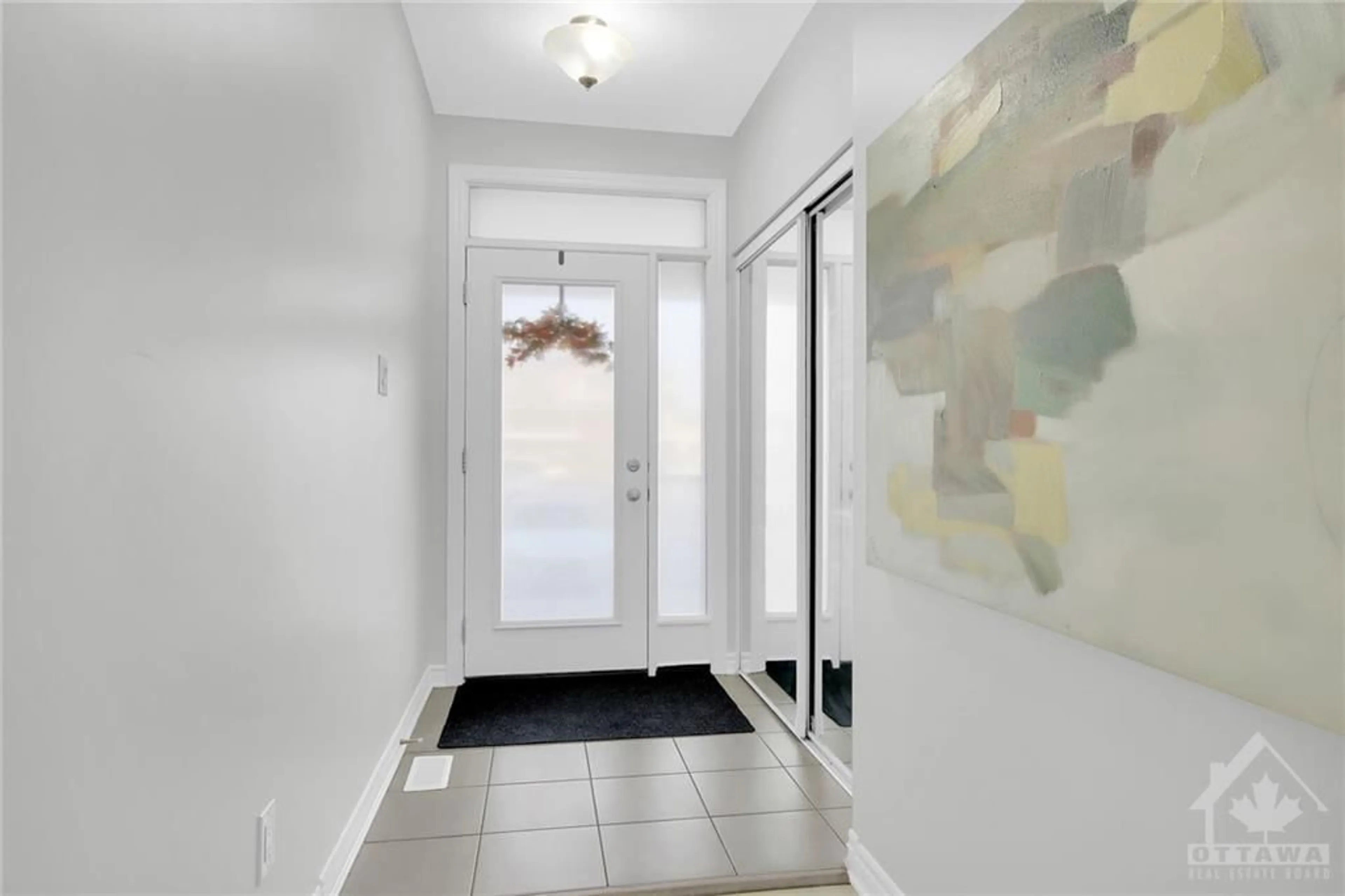 Indoor entryway, wood floors for 146 WALLEYE Pvt, Ottawa Ontario K2J 6R2